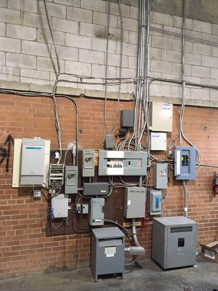 This Toronto factory renovation image captures an industrial space during active construction and interior transformation. The project includes demolition, structural adjustments, and layout reconfiguration to prepare for a more efficient production and storage environment. Reno Compass Inc., a trusted Toronto renovation company specializing in commercial and factory renovations, focuses on safe construction practices, durable materials, and optimized space planning to support modern industrial operations and long-term functionality.