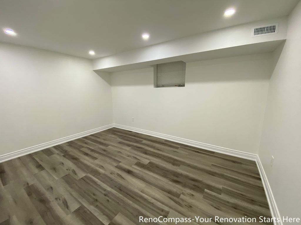 This Richmond Hill basement renovation showcases the main entertainment and multi-purpose area with newly installed flooring, recessed ceiling lights, and clean wall finishes. The long, open layout provides flexibility for a family room, home theater, or recreational space, while consistent materials and lighting help create a bright, comfortable basement environment.
City: Richmond Hill · Toronto contractor: Reno Compass