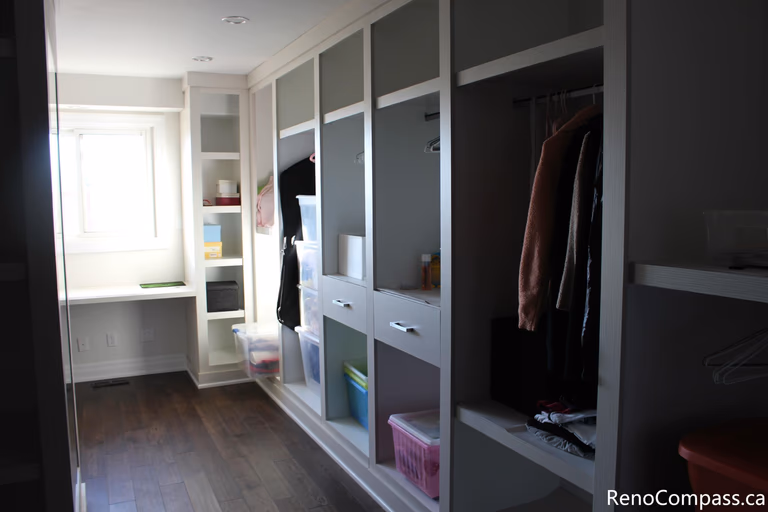 This custom built-in closet system is part of a full home renovation project in Mississauga completed by a professional Toronto renovation company. Designed with integrated shelving, hanging space, and storage compartments, the wardrobe maximizes organization while maintaining a clean modern look. The renovation improves daily functionality, lighting, and storage efficiency, creating a bright and well-structured interior that enhances both comfort and property value.