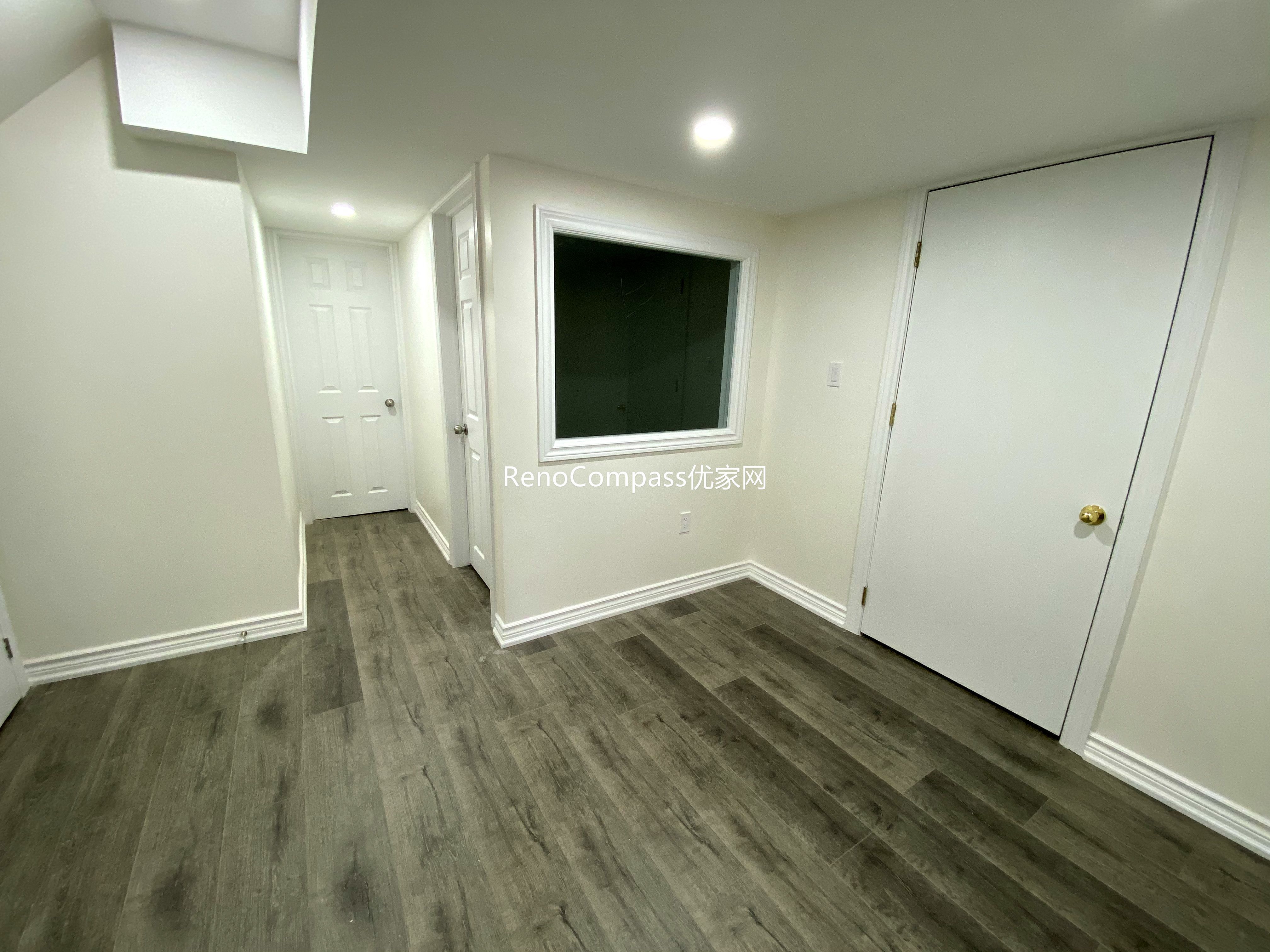 Basement bedroom renovation in Richmond Hill featuring new flooring, modern lighting, and clean wall finishes. Completed by a professional Toronto renovation company, this finished basement room offers a bright and functional living space ideal for guest accommodation, rental use, or extended family living.