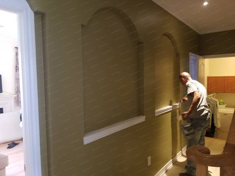 This image shows the construction stage of a basement renovation project in Vaughan, featuring custom arched wall niches and detailed drywall framing. The design enhances visual depth and architectural character while preparing the space for a refined finished basement. Completed by an experienced Toronto renovation company with a focus on craftsmanship and structure.