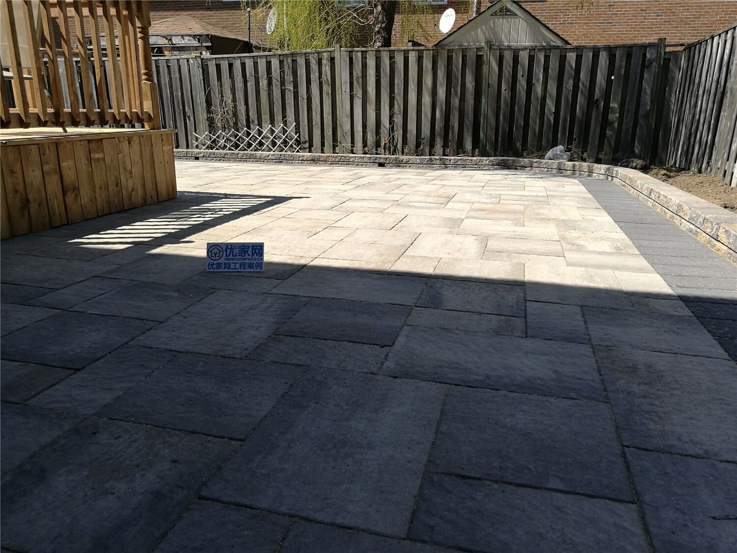 This Richmond Hill landscaping renovation showcases a newly completed backyard patio with large-format interlocking stone installation. Designed for durability and modern outdoor living, the spacious patio features clean lines, contrasting border stones, and precise leveling for proper drainage. The upgraded hardscape creates a functional entertainment area perfect for family gatherings while enhancing the overall backyard layout and property value. Professional installation ensures long-lasting performance, weather resistance, and a refined outdoor finish suitable for all-season use in the GTA.