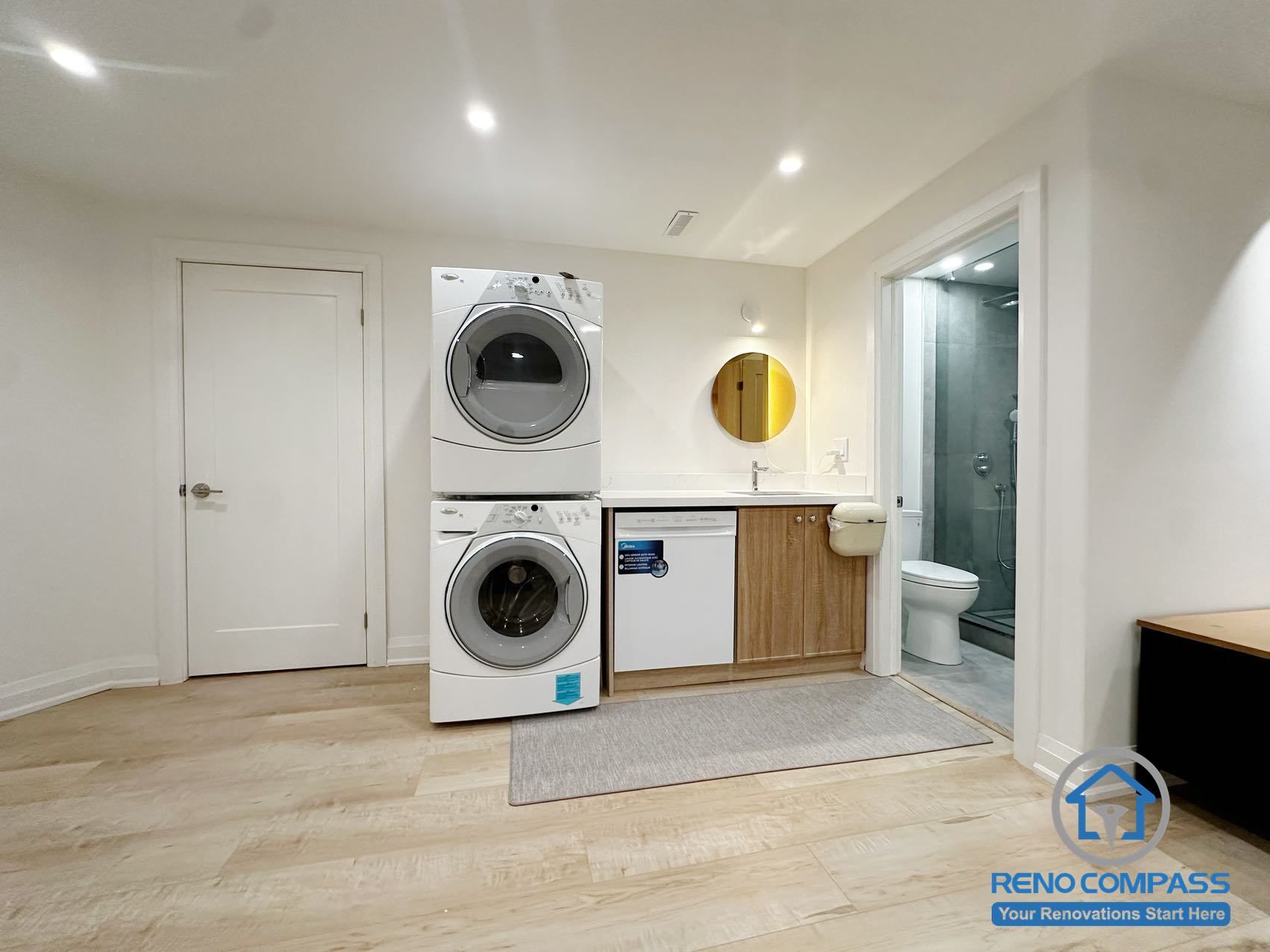 Laundry area from a completed interior renovation project in Markham, featuring a clean and functional utility space by Reno Compass.