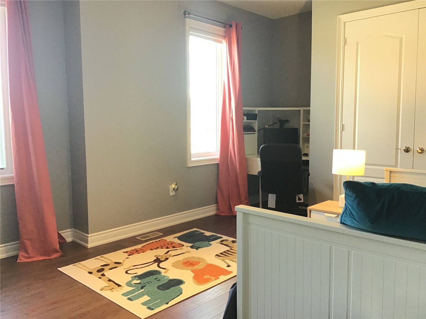 This Markham full home renovation features a bright and functional kids’ bedroom with hardwood flooring, large windows, and a flexible layout for study and play. The space combines comfort and practicality, making it ideal for growing families. Completed by a trusted Toronto Renovation Company, this design supports both daily living and long-term usability.