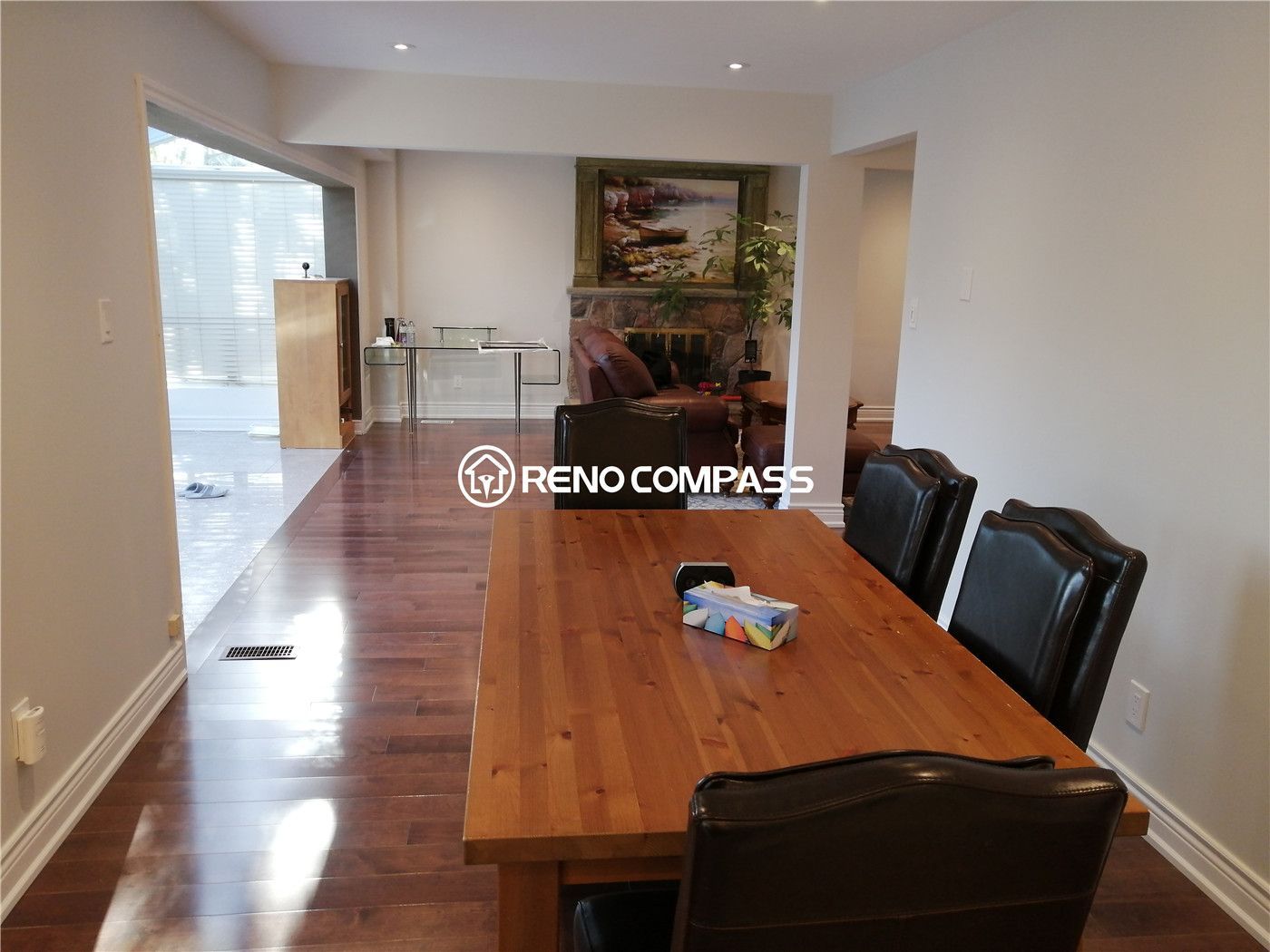 This open dining area is part of a North York interior renovation, designed to create a smooth transition between dining and living spaces. The layout features warm hardwood flooring, recessed ceiling lighting, and a clean, open flow that supports everyday meals and gatherings. Natural light enhances the space, while the simple finishes allow flexibility for different furniture arrangements. The balanced proportions and practical circulation reflect the thoughtful planning and craftsmanship expected from a professional Toronto interior renovation project.