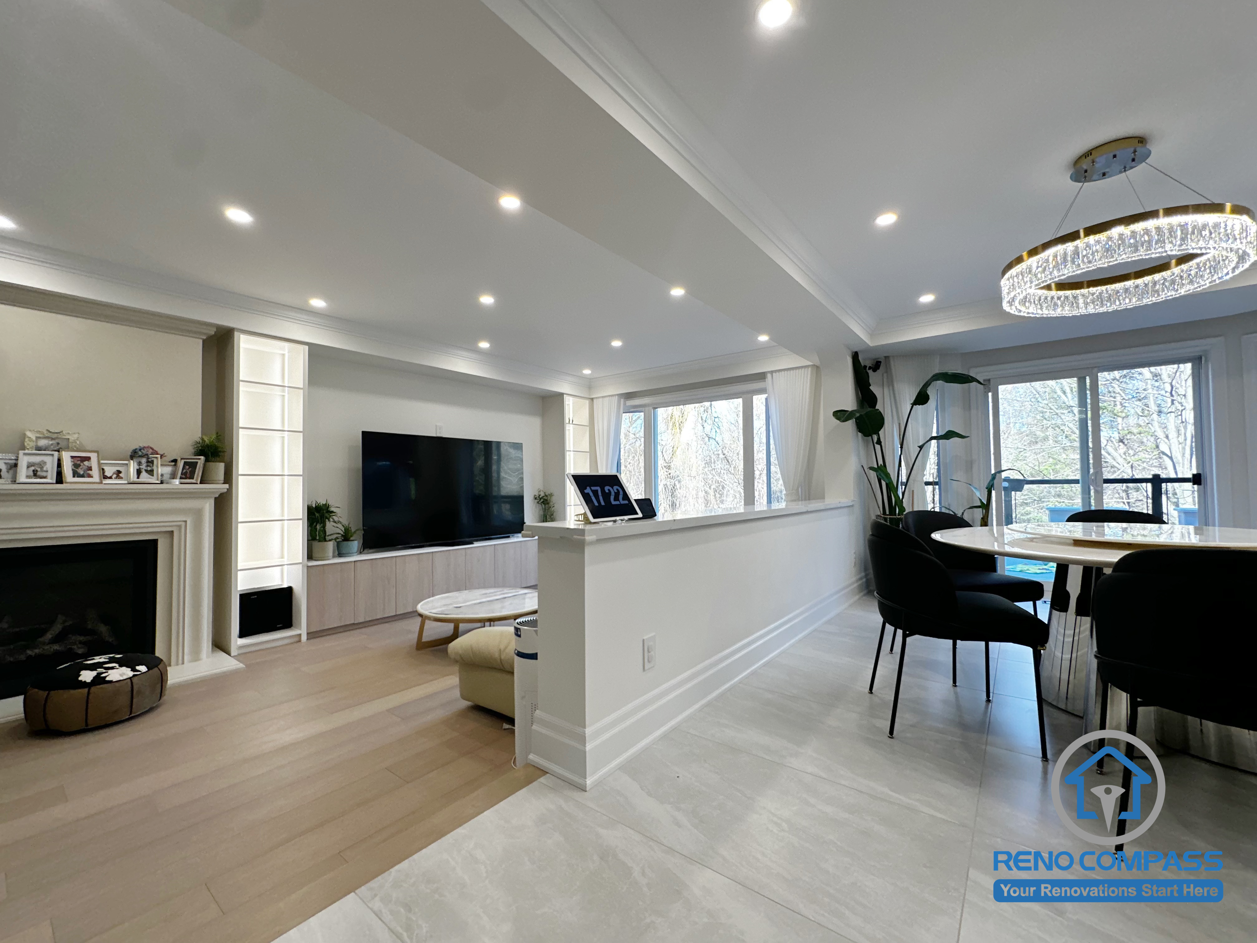 This Markham interior renovation focuses on improving overall spatial flow and visual continuity between the living and dining areas. By opening up the layout and redefining functional zones, the space now feels brighter, more connected, and better suited for everyday living and family gatherings.

The renovation integrates clean ceiling lines, recessed lighting, and consistent flooring transitions to create a cohesive interior experience. Built-in elements and subtle partitions help define different areas without breaking sightlines, allowing natural light to travel through the space while maintaining a clear sense of structure and balance.

Designed with long-term comfort and practicality in mind, this interior renovation reflects a thoughtful approach to layout optimization and modern residential living in Markham.