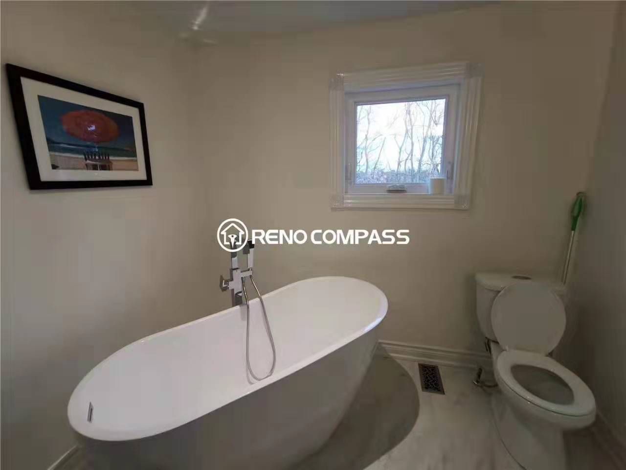 This modern bathroom renovation in Markham features a sleek freestanding bathtub, updated plumbing fixtures, and a bright, minimalist layout designed for comfort and relaxation. Completed by a trusted Toronto renovation company, the space was upgraded with new flooring, improved lighting, and a clean neutral palette to create a functional yet elegant bathing environment. Ideal for homeowners looking to enhance both style and daily usability through professional bathroom renovation in the Markham area.