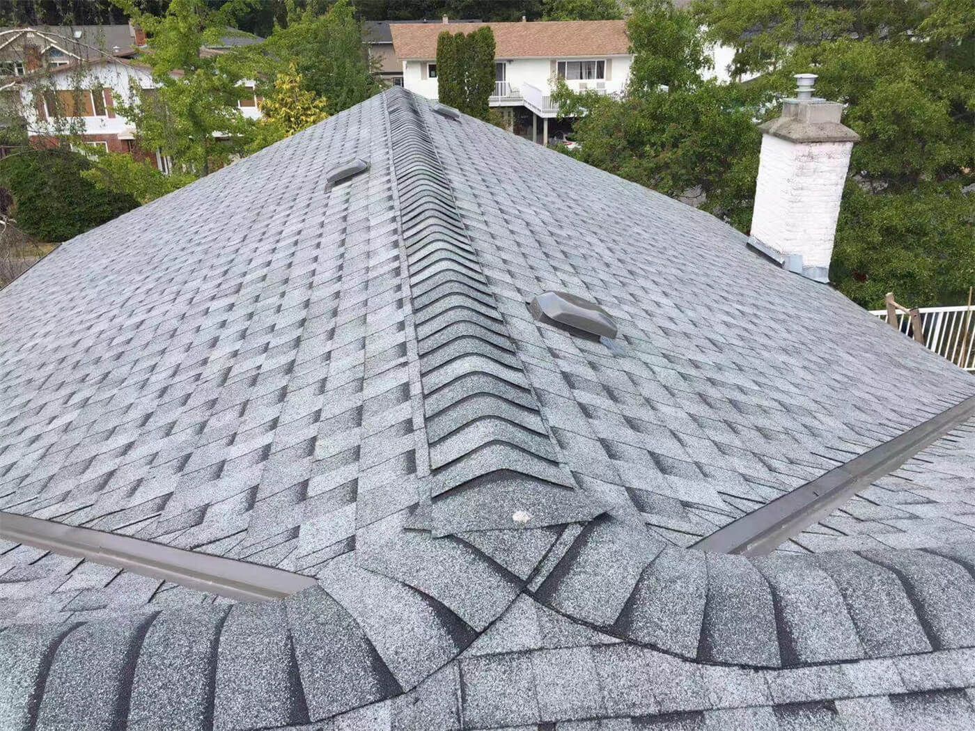 This image showcases the completed stage of a residential roofing replacement project in Toronto, featuring newly installed asphalt shingles with clean alignment and consistent finishing. The roofing system has been carefully installed to ensure proper ventilation, waterproof protection, and long-term durability against Toronto’s seasonal weather conditions. Attention to detail in shingle layout, ridge finishing, and overall roof slope enhances both structural performance and exterior curb appeal. Completed by a professional Toronto roofing and renovation team, this new roof installation provides improved energy efficiency, reliable protection, and a refreshed exterior look for the home.