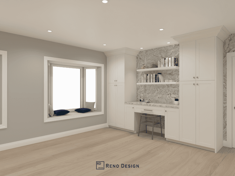 This image features a custom-designed home office and reading nook within a Toronto bungalow interior renovation. Built-in cabinetry, integrated shelving, and a compact work desk create a functional yet elegant workspace, while the window seating area adds comfort and natural light. Clean finishes and thoughtful storage solutions enhance both usability and visual balance. Designed and completed by Reno Compass, this space reflects a modern, flexible interior design approach for single-level homes in Toronto.