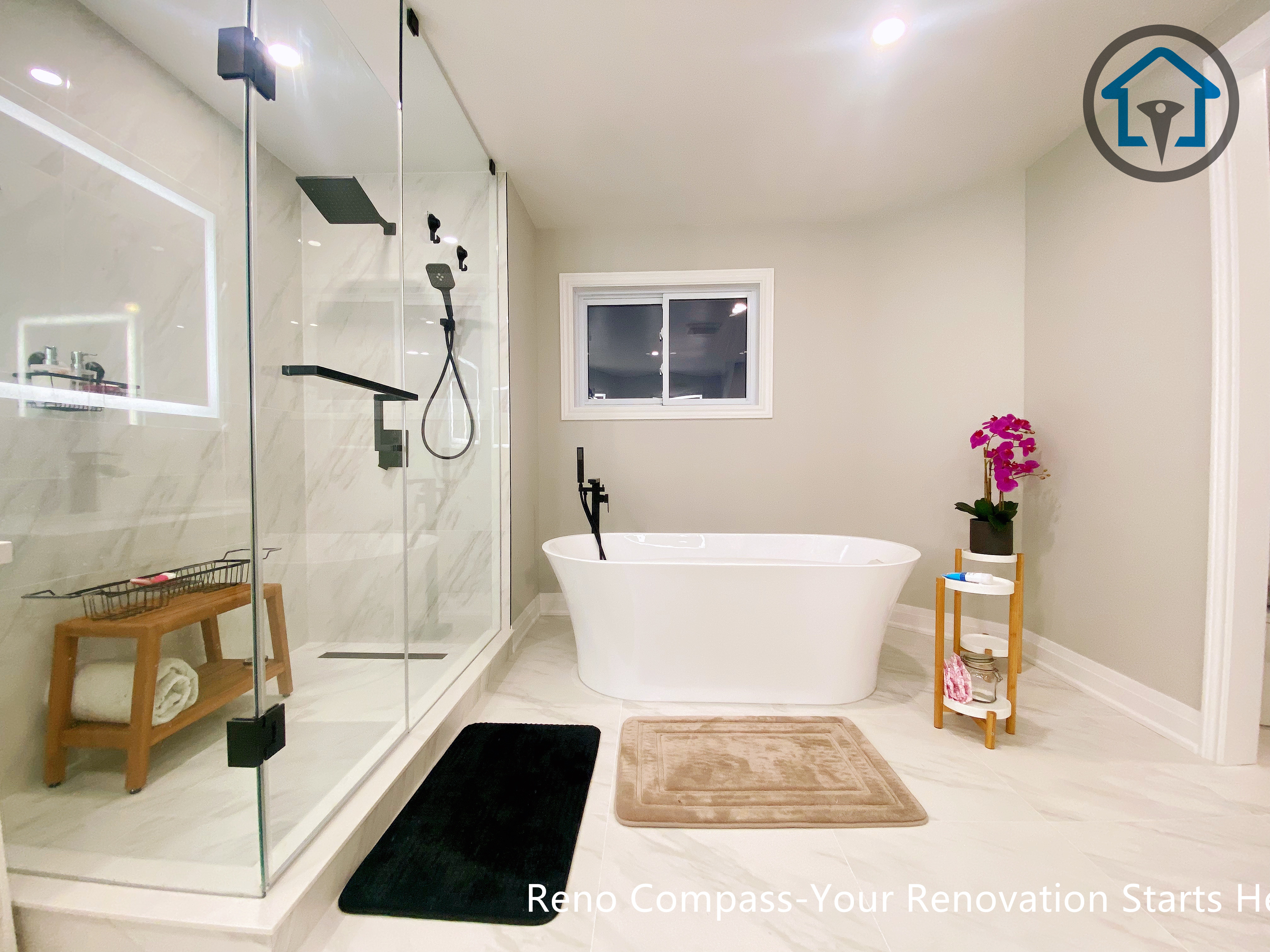 Bright and modern primary bathroom renovation in Newmarket featuring a clean layout, neutral tones, and improved accessibility designed for comfortable long-term living.