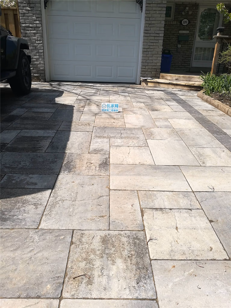 This Markham front yard renovation features a newly installed interlocking stone driveway designed to improve curb appeal, durability, and drainage performance. The modern stone pattern creates a clean and structured entrance while providing a stable surface for daily vehicle use. Completed by a professional Toronto renovation and landscaping contractor, the project combines precise grading, solid base preparation, and high-quality materials to ensure long-term strength and low maintenance.