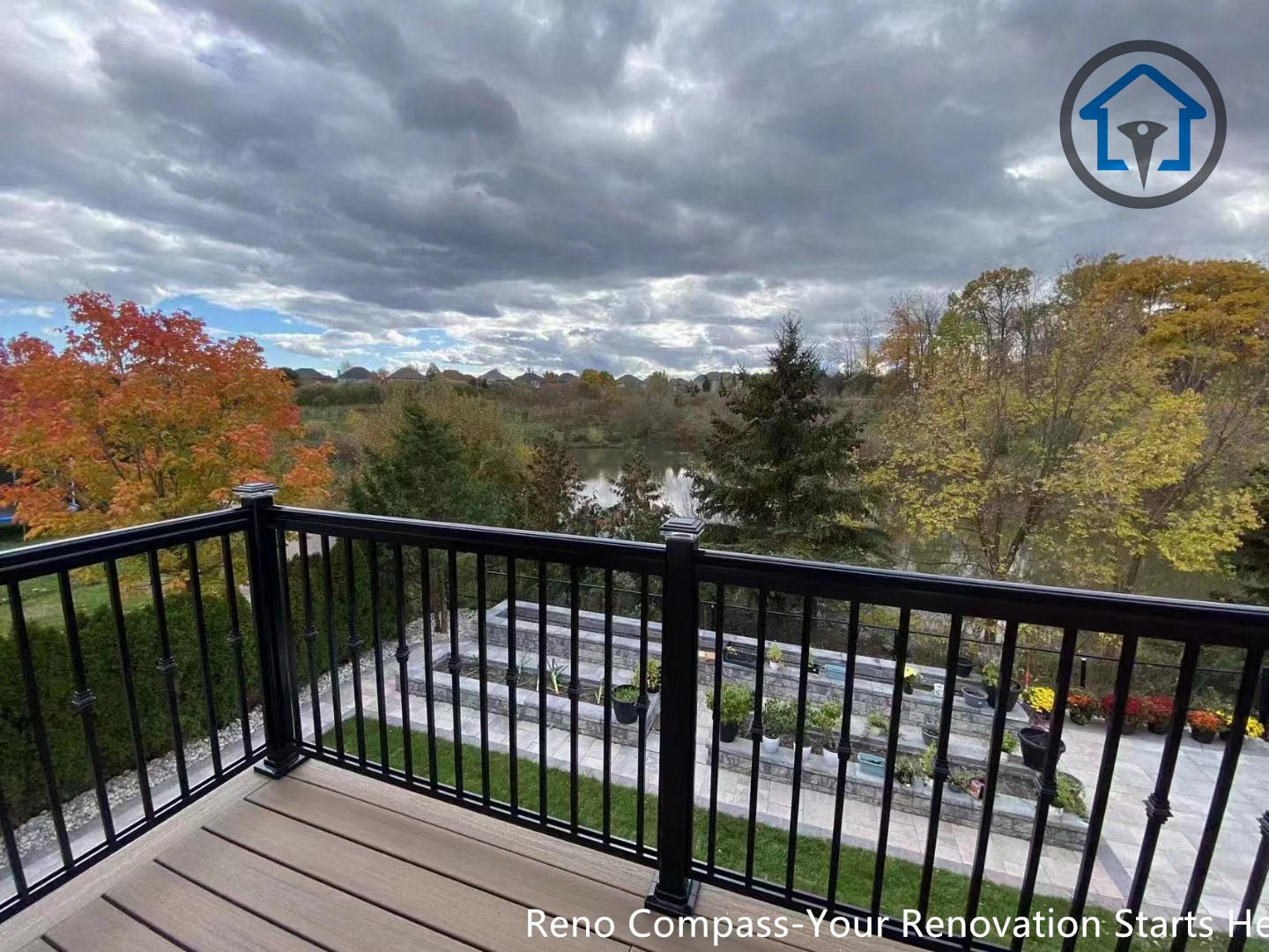 This wide-angle view presents a full driveway and patio interlocking renovation in Oakville. The cohesive stone design connects driveway, walkway, and outdoor living spaces into one unified exterior layout. A high-quality residential paving project by Reno Compass Inc.