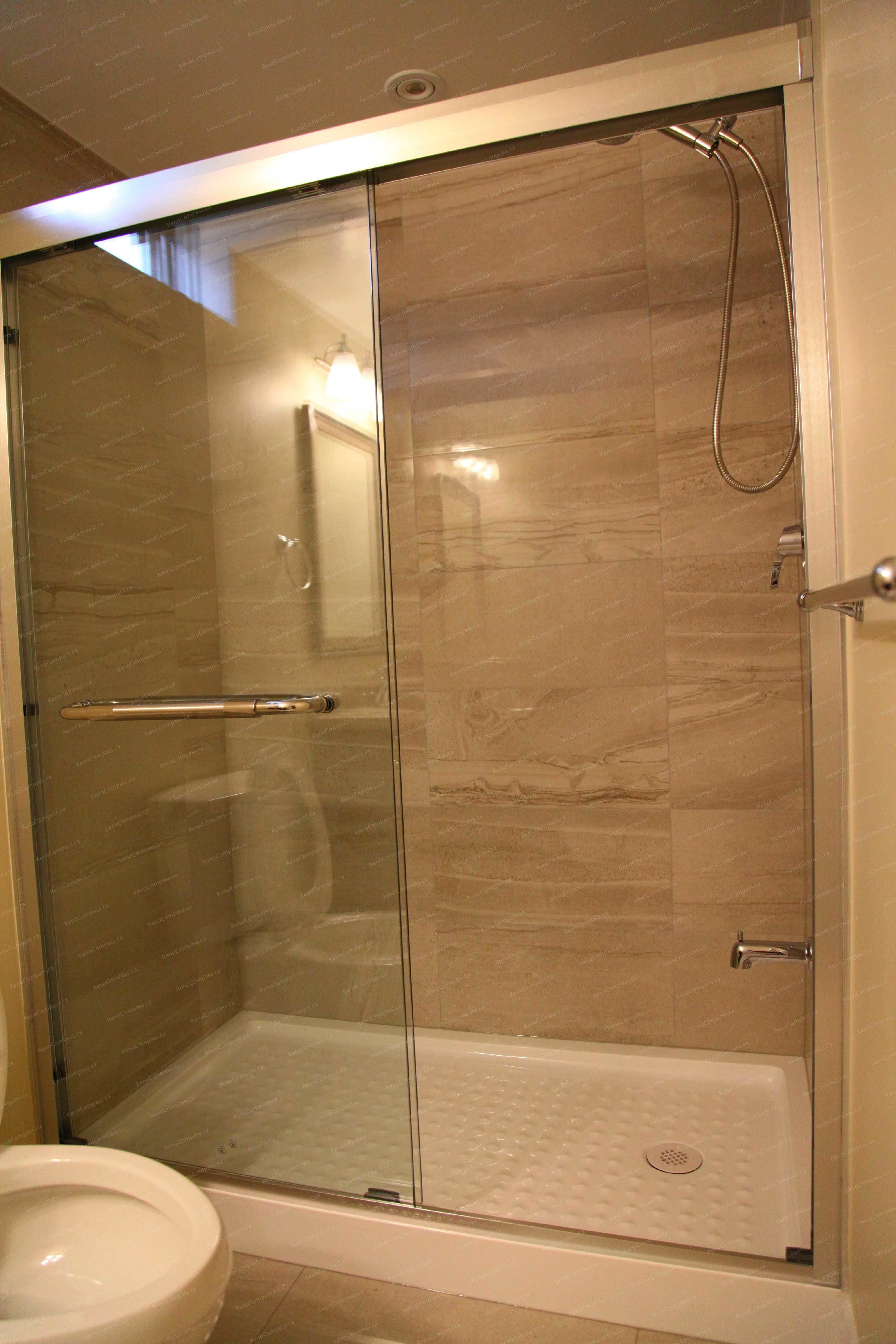 This image focuses on the finished basement flooring and baseboard details in a Markham basement renovation project. The space features durable, low-maintenance flooring suitable for basement environments, paired with clean white baseboards that create a polished transition between walls and floors. Attention to material selection and finishing details ensures long-term performance, visual consistency, and everyday comfort, delivered by a professional Toronto renovation company.