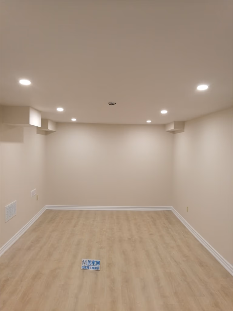 Newly finished basement renovation in Markham featuring smooth drywall finishing, recessed LED pot lights, and durable modern flooring. This clean and spacious layout enhances functionality and comfort, creating a bright multi-purpose living area for entertainment or family use. Completed by a trusted Toronto renovation company serving the GTA.