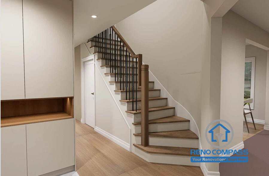 This Scarborough interior design project features a beautifully redesigned staircase with solid wood treads, contemporary black metal balusters, and clean architectural lines. The staircase seamlessly connects with the open-concept main floor, enhancing circulation, natural light, and the home's modern minimalist aesthetic.