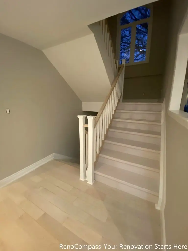This interior renovation in Markham features a refreshed staircase area with light wood flooring, white balusters, and a clean handrail design. Soft neutral wall tones were selected to enhance brightness and create a smooth visual transition between floors. The updated staircase improves circulation, safety, and overall spatial flow while maintaining a timeless, understated aesthetic suitable for everyday family living.
City: Markham · Toronto contractor: Reno Compass
