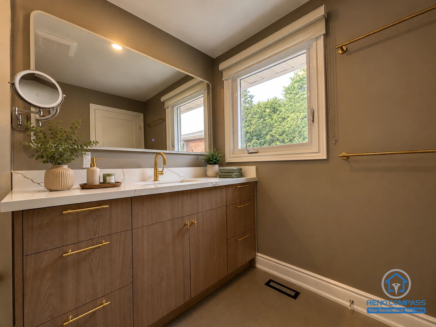 This modern bathroom vanity was renovated as part of a whole house renovation in North York. Featuring a custom walnut vanity, quartz countertop, oversized mirror, and brushed gold fixtures, the space offers a bright, elegant, and functional design that blends premium craftsmanship with everyday practicality.