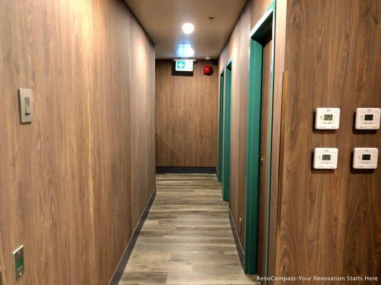 This Barrie commercial renovation features a finished interior hallway with custom wood wall panels, durable flooring, and modern lighting installation. The clean corridor layout enhances both functionality and customer flow within the commercial space. Completed by Reno Compass Inc., a professional Toronto renovation company, this project demonstrates high-quality craftsmanship for bubble tea shops, retail stores, and commercial interiors across Barrie and the GTA.