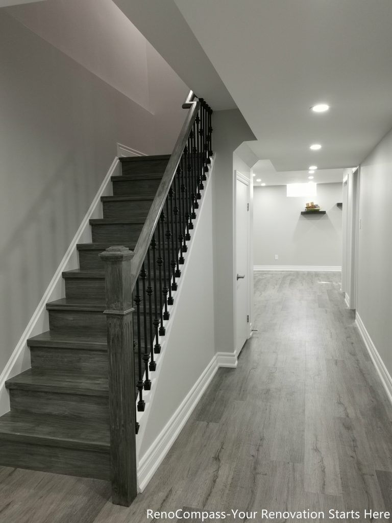 This Oakville basement renovation showcases a modern staircase and hallway upgrade with new flooring, fresh wall finishes, and recessed pot lights that brighten the entire lower level. The redesigned layout creates a clean and seamless transition between floors while improving both safety and visual appeal. Completed by a trusted Toronto renovation company, this finished basement upgrade enhances functionality, lighting, and overall home value while delivering a stylish and durable modern living space.