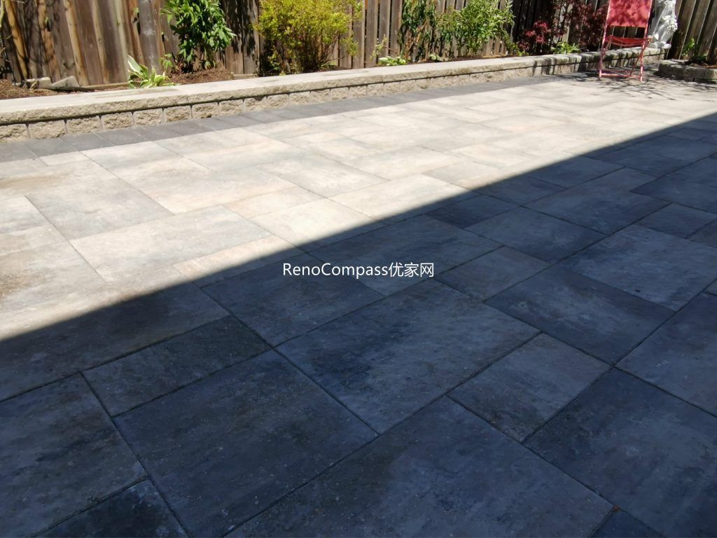 Full view of the completed Mississauga backyard interlocking patio featuring modern large-format stone pavers, clean layout, and spacious outdoor seating area designed for durability and low maintenance.