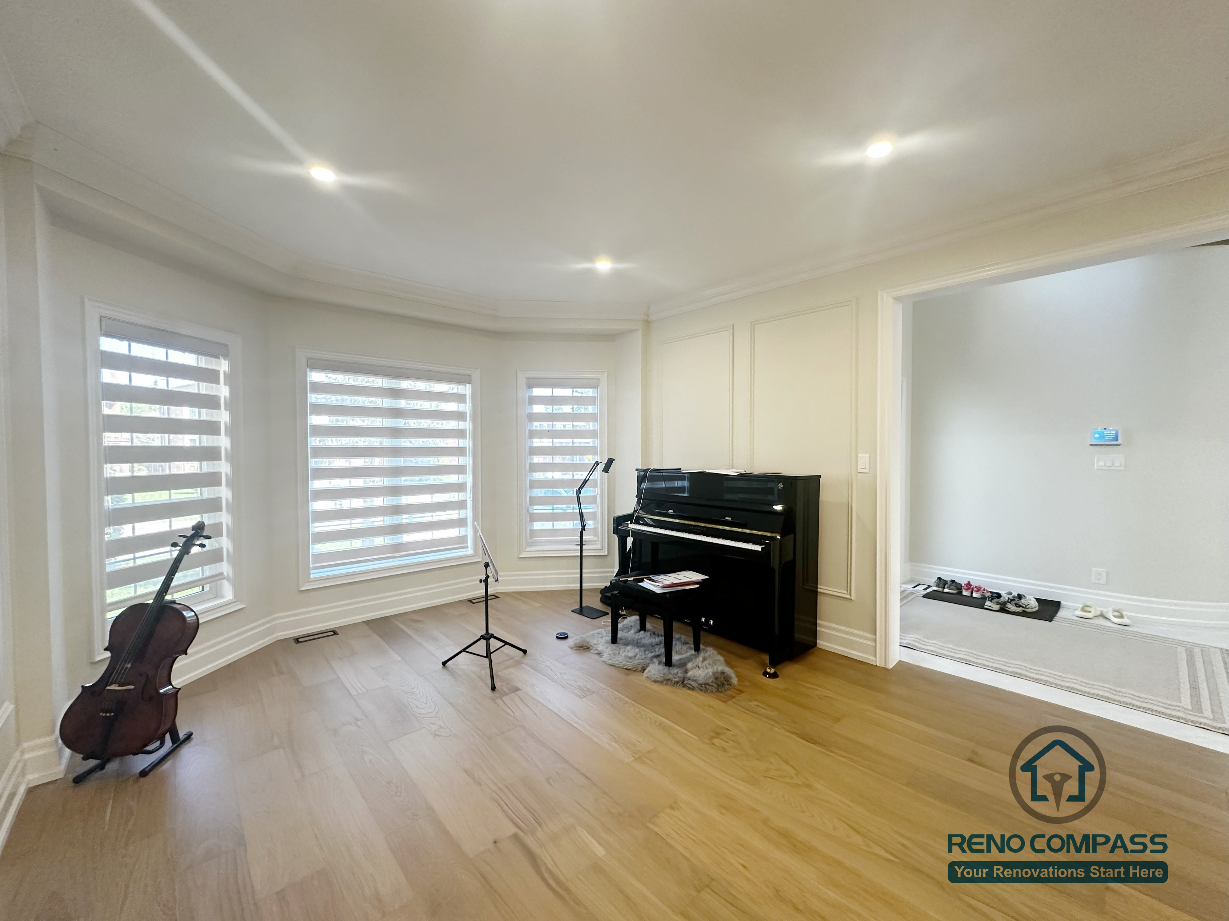 This image highlights a stair renovation completed in North York, focusing on the integration of a curved staircase within an open living space. The staircase serves as a key transitional element between floors, connecting surrounding areas while maintaining visual flow and balance. Clean wall detailing, recessed lighting, and open sightlines complement the stair design without altering the existing flooring. This renovation emphasizes precise stair craftsmanship and thoughtful spatial coordination within North York homes.