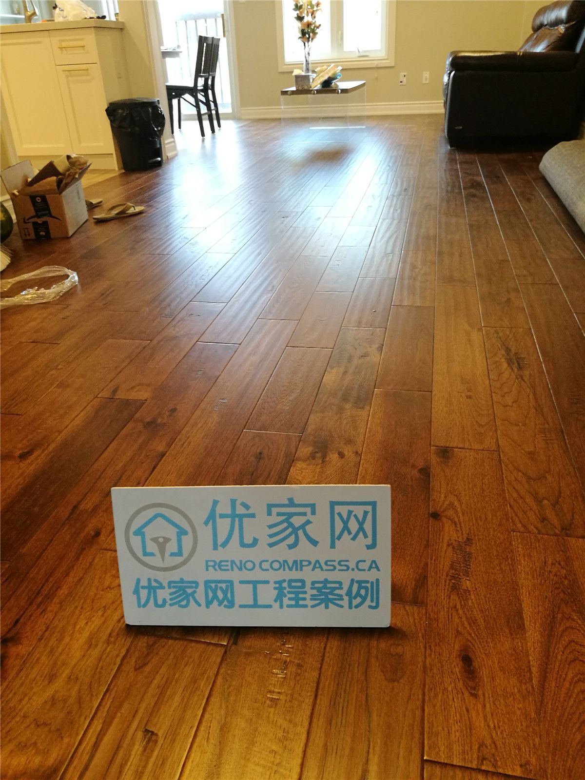 Completed hardwood flooring installation in Richmond Hill and Markham interior renovation project, featuring high-quality wood finish and precision craftsmanship by Toronto renovation company Reno Compass Inc.