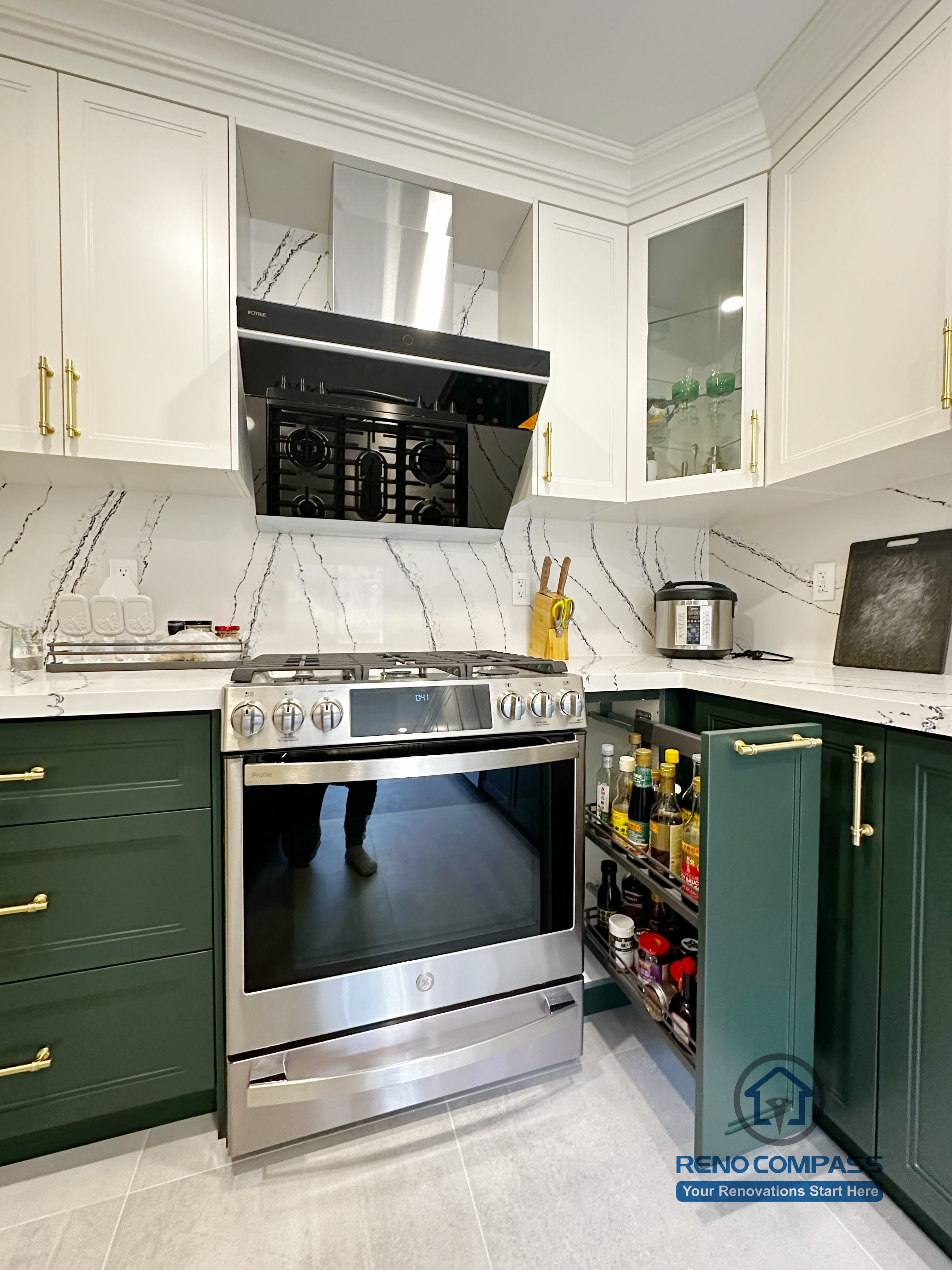 This Mississauga kitchen renovation highlights a central cooking zone featuring a stainless steel range, custom cabinetry, pull-out spice storage, and a built-in range hood. The design improves cooking efficiency, organization, and ventilation while maintaining a clean and cohesive kitchen layout.