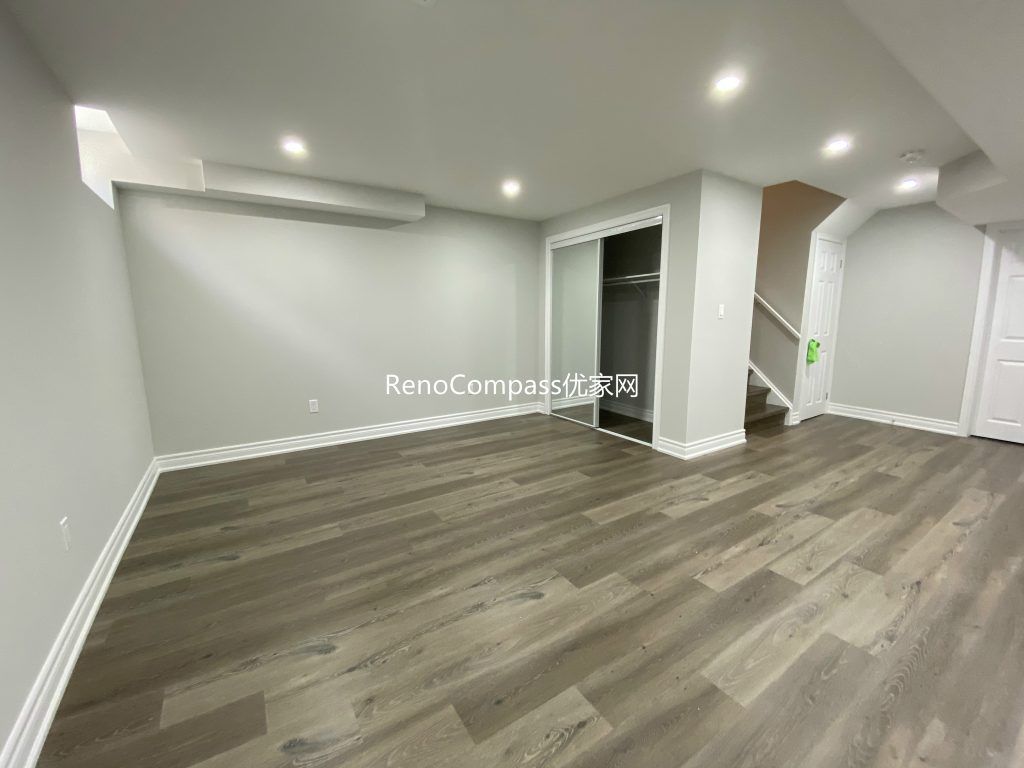 Contemporary Richmond Hill interior renovation featuring clean wall paint tones, seamless laminate flooring, and expert craftsmanship. Reno Compass enhanced this home’s comfort and visual appeal.