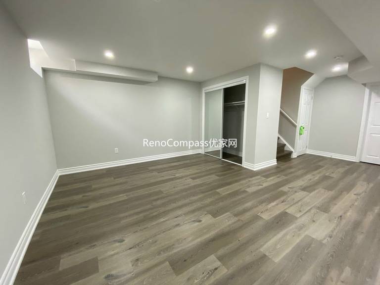 Contemporary Richmond Hill interior renovation featuring clean wall paint tones, seamless laminate flooring, and expert craftsmanship. Reno Compass enhanced this home’s comfort and visual appeal.