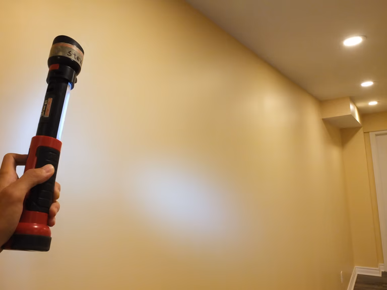 During this Vaughan basement renovation, detailed electrical inspection and finishing work were carefully completed by a professional Toronto Renovation Company. The space features smooth painted walls, upgraded recessed pot lights, and precise finishing that enhances both safety and visual comfort. Proper lighting placement and clean wall finishes create a bright, functional basement environment suitable for entertainment, family use, or future customization. This project reflects quality workmanship and attention to detail for modern basement upgrades across the GTA.