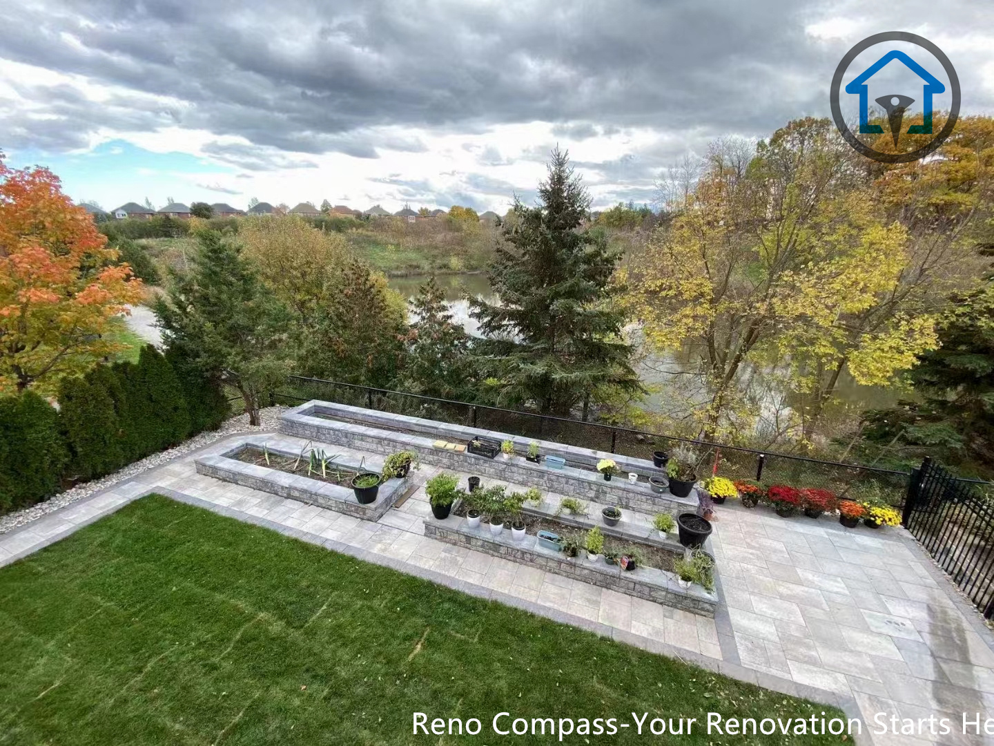 This image captures the completed outdoor interlocking paving work in Oakville, showing a refined front yard upgrade with durable stone surfaces. The renovation enhances both property value and daily usability. Professionally designed and constructed by Reno Compass Inc.
