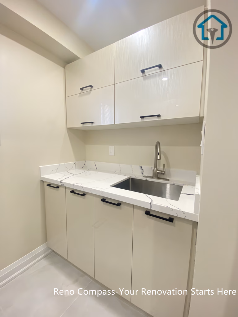 Utility kitchen area from a completed interior renovation project in Vaughan, featuring a clean and functional cabinetry layout by Reno Compass.