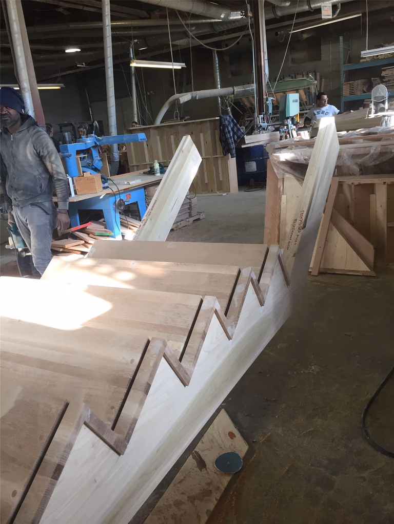 This image shows the fabrication process of a custom hardwood stair stringer during a Toronto staircase renovation project. The precisely cut notches along the stair structure are designed to support each stair tread, ensuring proper spacing, strength, and long-term durability. Skilled carpentry and accurate measurements are essential when building custom stair components like this. As an experienced Toronto Renovation Company, Reno Compass Inc. provides professional staircase renovation and custom woodworking solutions for residential projects throughout Toronto and the Greater Toronto Area.