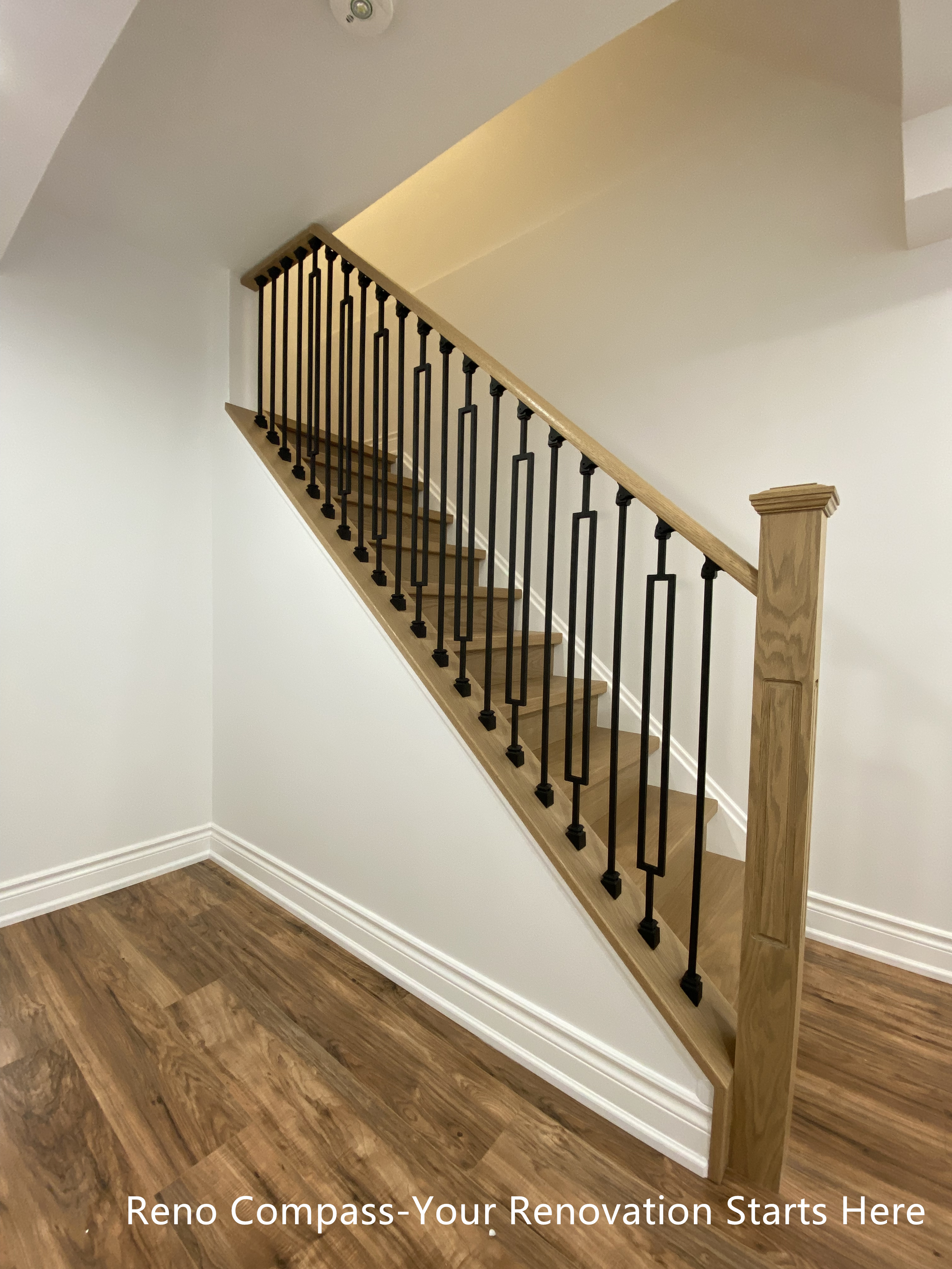The basement staircase renovation focuses on safety, circulation, and spatial efficiency. Finished with consistent flooring, updated railings, and optimized lighting, this design improves access between levels and integrates seamlessly into the overall Bradford basement renovation project.