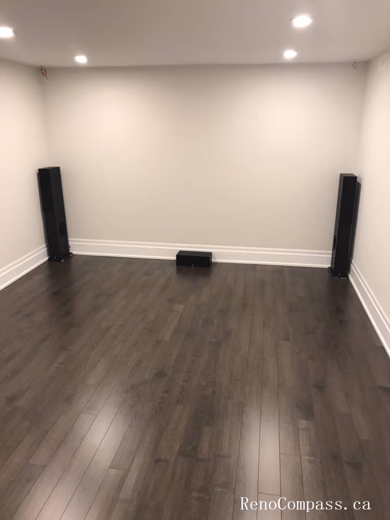 Finished basement renovation in Richmond Hill showcasing a newly completed basement bedroom with modern hardwood flooring, upgraded lighting, and fresh neutral wall finishes. This basement upgrade improves living space functionality, comfort, and property value with clean design and quality craftsmanship.