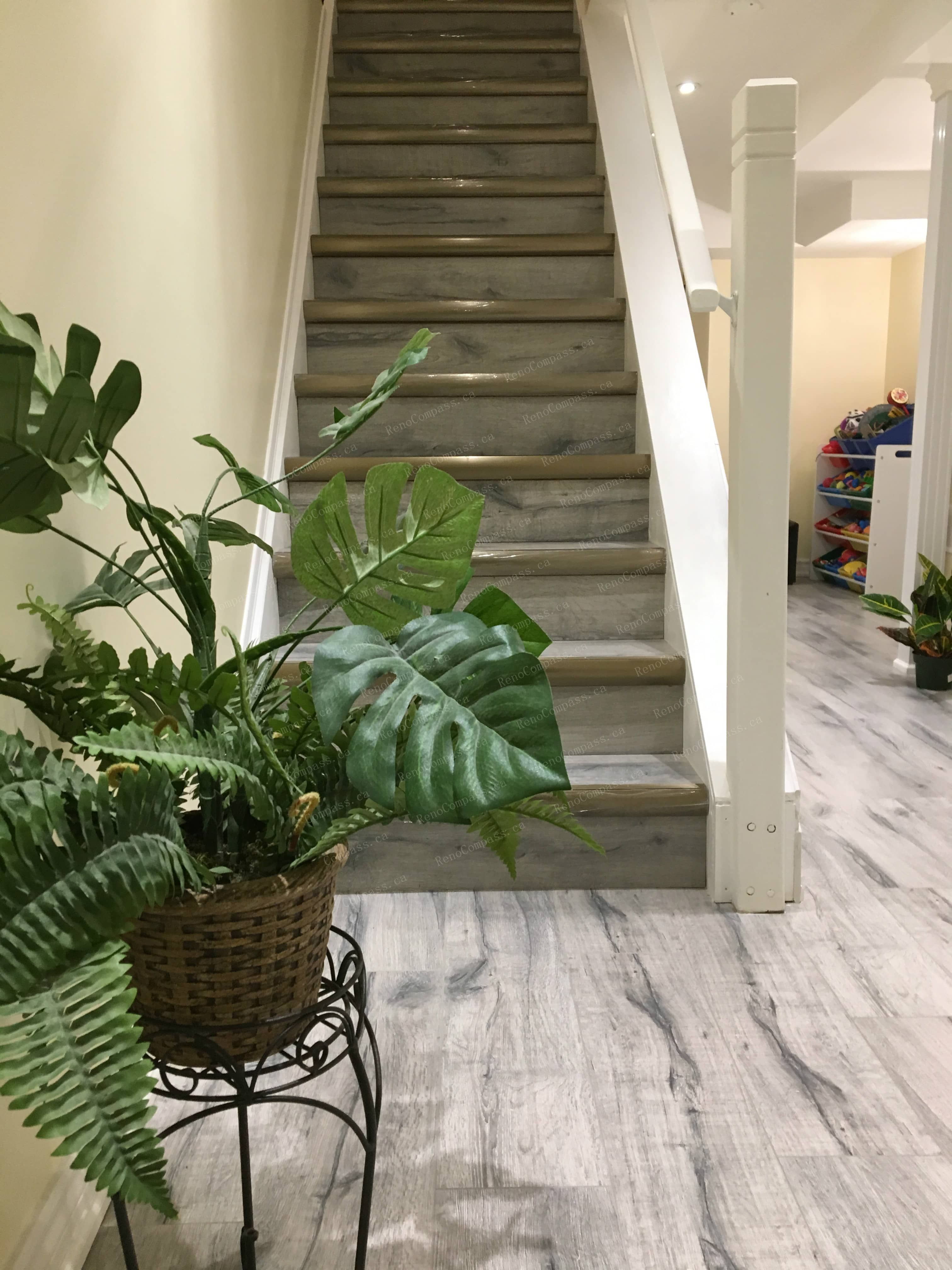 This Mississauga basement renovation includes a fully upgraded staircase with modern wood steps and clean side railings, creating a smooth transition from the main floor to the finished basement. Completed by a reliable Toronto renovation company, the staircase design enhances safety, durability, and visual continuity, complementing the one-bedroom, one-bathroom basement layout with a bright and cohesive finish.