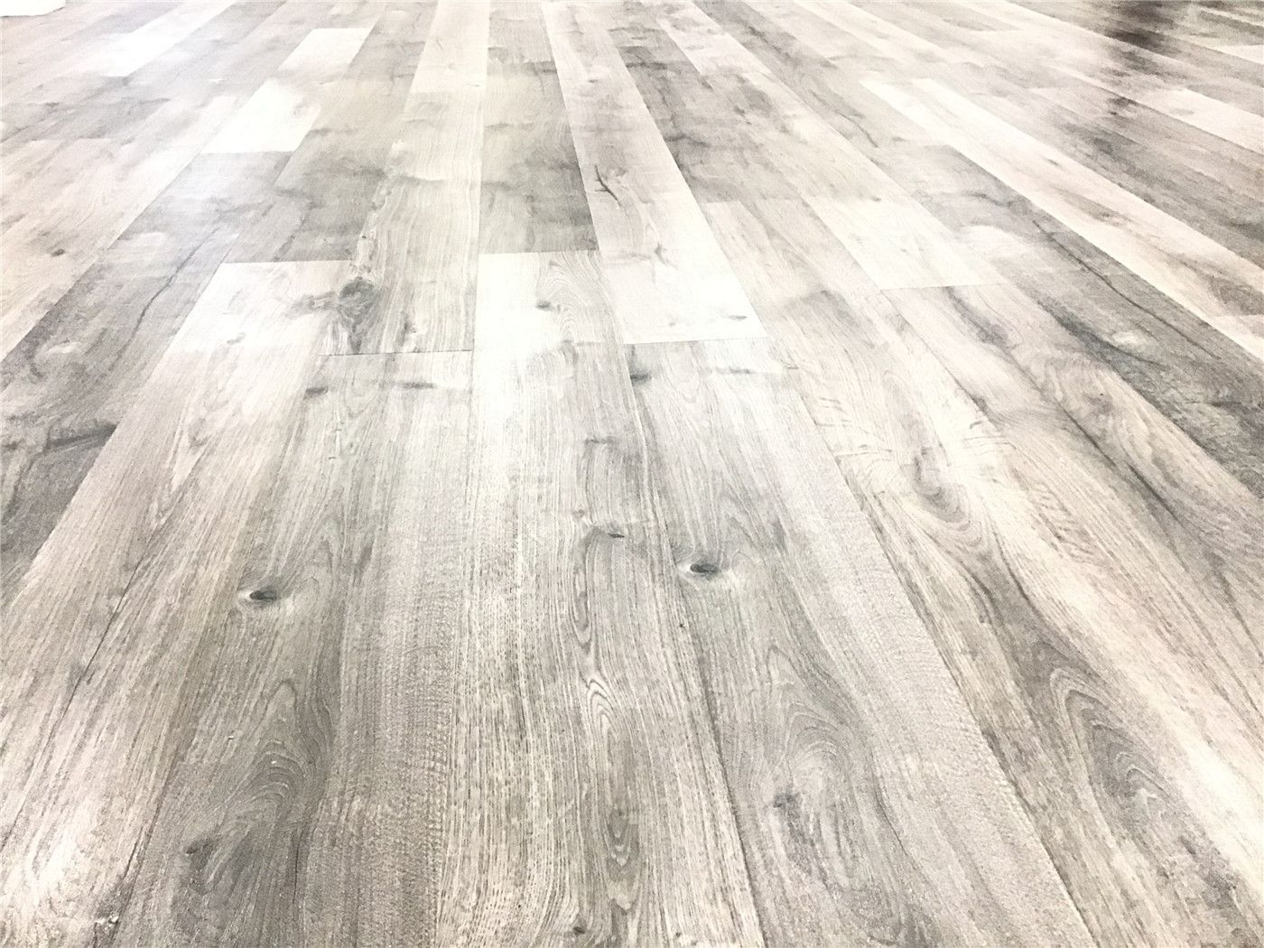 High-quality grey-toned vinyl plank flooring installed in this Newmarket basement renovation. The modern wood-look finish adds warmth, durability, and a clean contemporary feel, making the space both stylish and functional for everyday living.
