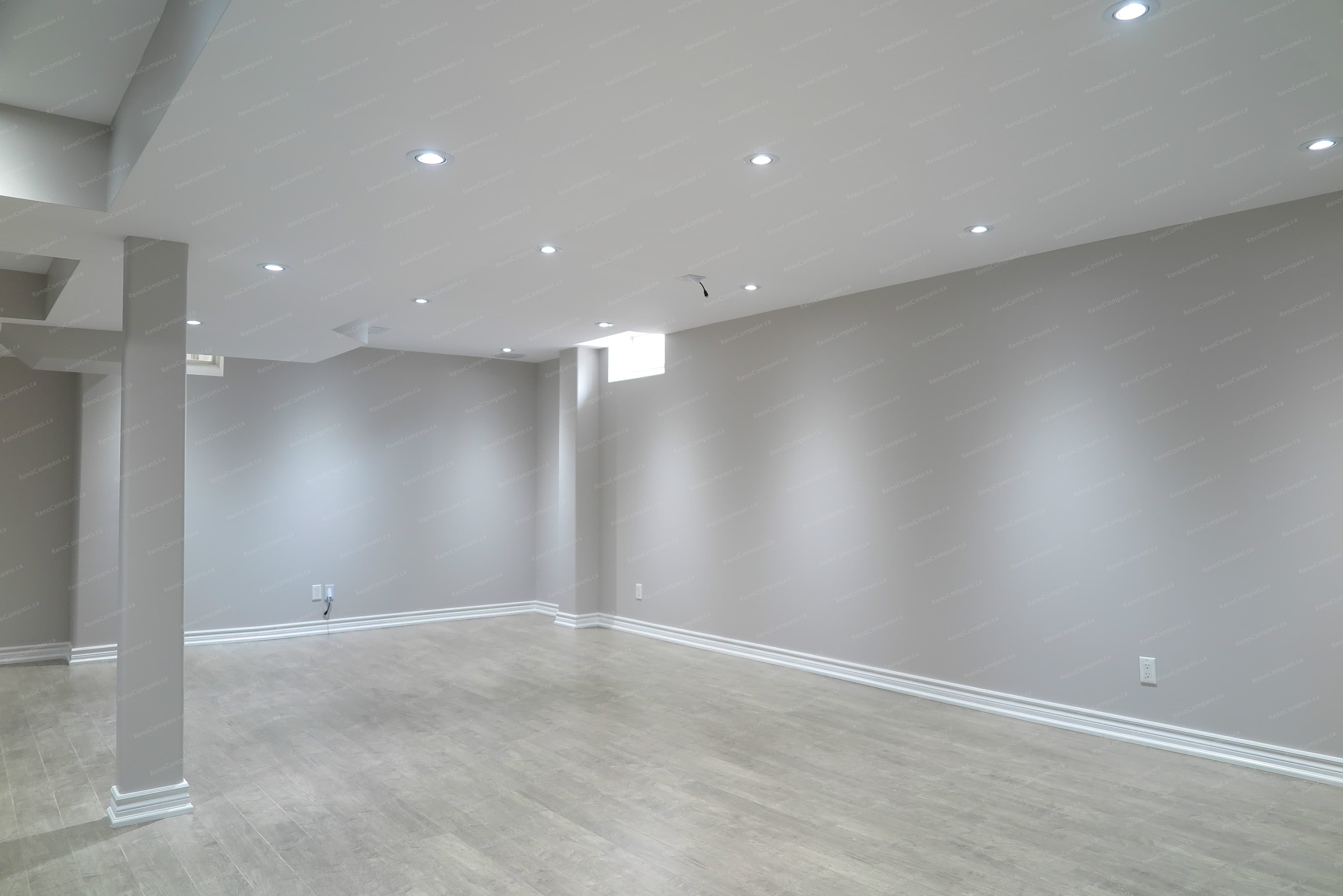 A modern open-concept basement renovation in Richmond Hill featuring clean lines, balanced lighting, and a functional layout designed for everyday living and relaxation.