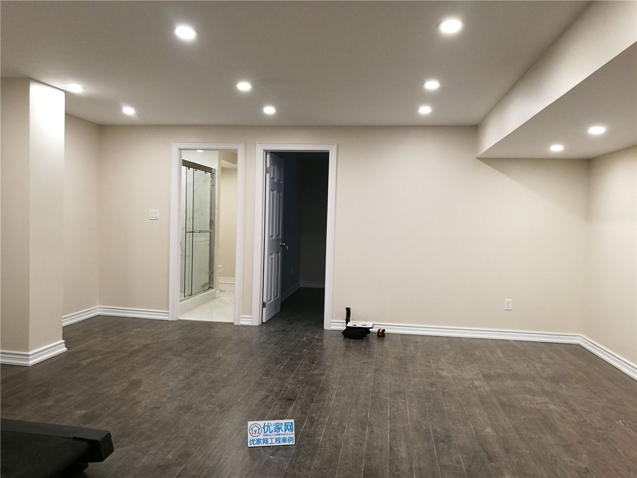This Scarborough basement renovation showcases a newly finished open-concept living space with modern recessed lighting, durable vinyl flooring, and a clean neutral color palette. The layout connects seamlessly to a newly renovated basement bathroom, creating a comfortable and functional extension of the home. Designed for versatility, the space can be used as a family lounge, rental suite, or entertainment area. Completed by a professional Toronto renovation company, this project highlights quality craftsmanship and thoughtful basement design for modern living.