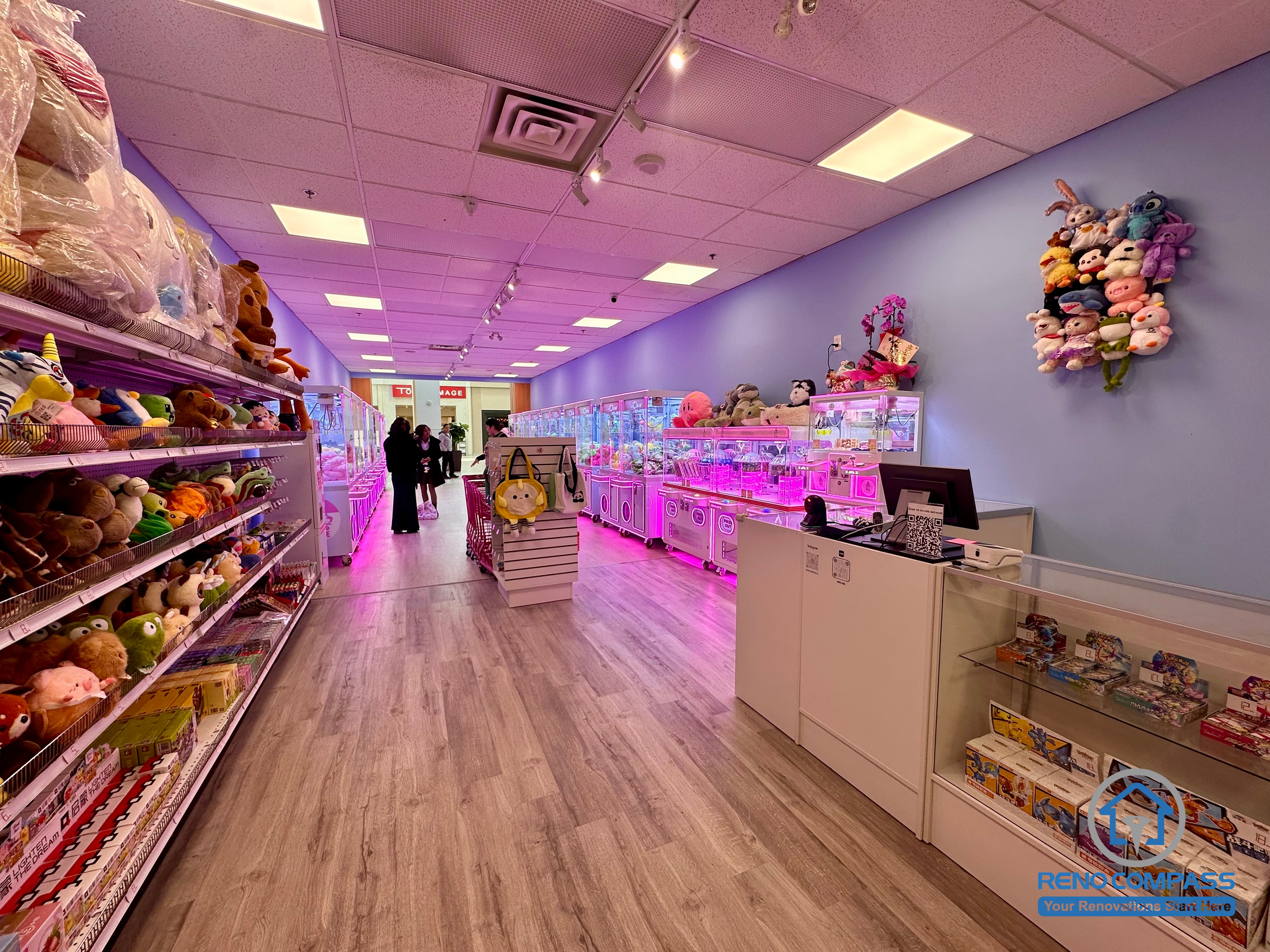 Commercial renovation of an arcade claw machine and game store inside Oakville Place Mall. The layout combines arcade gaming, prize display, and indoor playground-style entertainment space design.