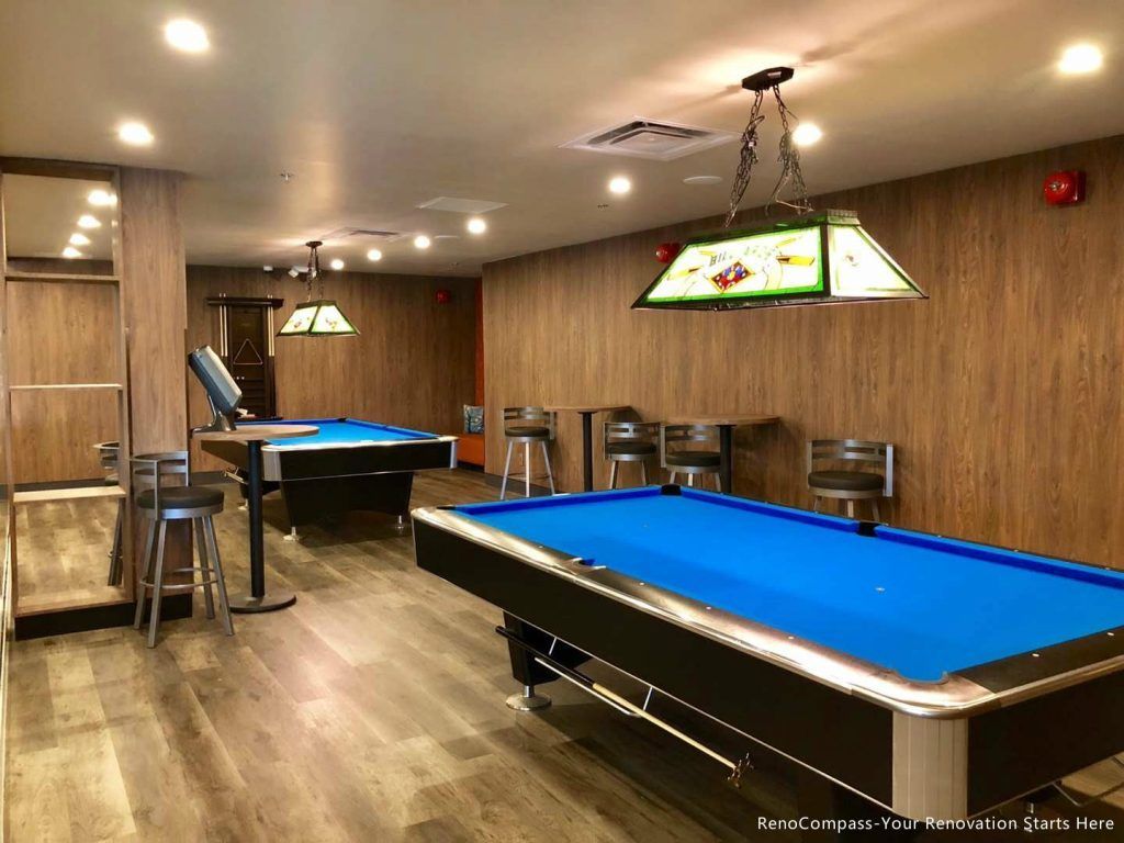 This Barrie commercial renovation project showcases a modern tea shop interior completed by Reno Compass Inc. Featuring custom wall finishes, durable commercial flooring, and a spacious seating and entertainment area with pool tables, the space is designed to attract customers and enhance the overall experience. As a trusted Toronto renovation company, Reno Compass delivers functional and stylish commercial spaces tailored for cafés, bubble tea shops, and retail businesses across the GTA and surrounding areas.