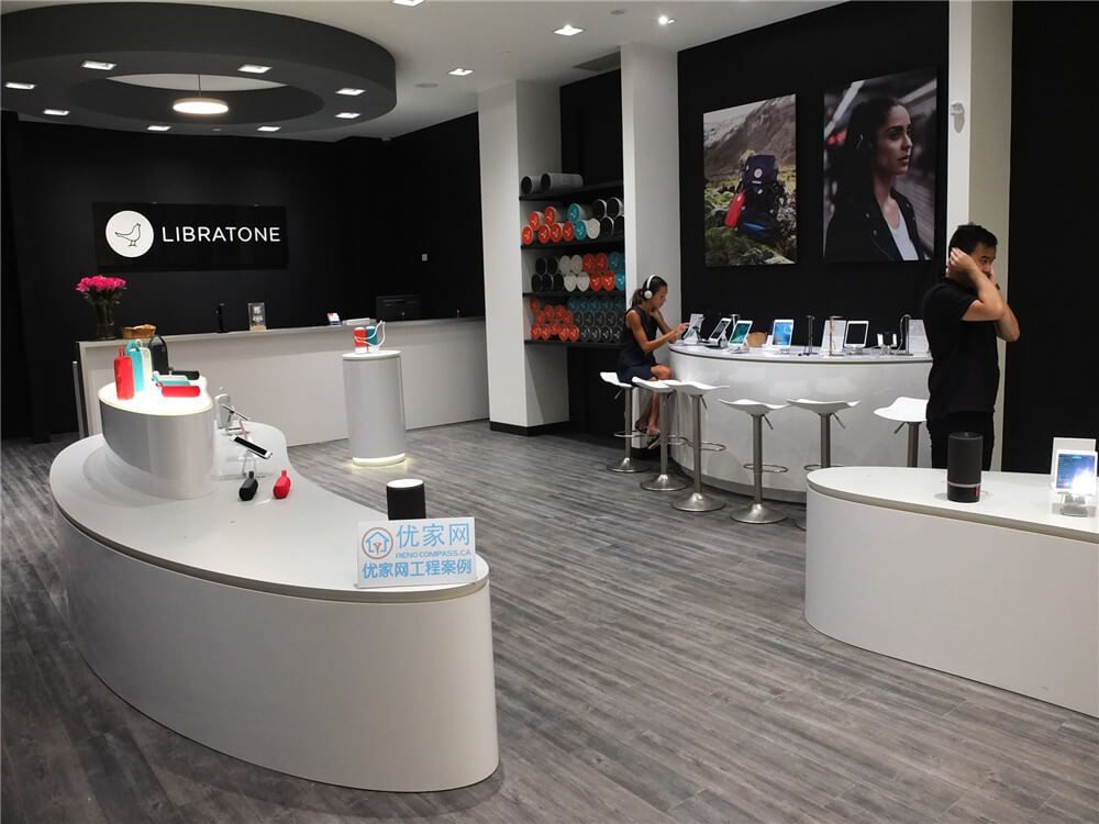 Commercial retail renovation inside Markville Mall featuring custom-built product display shelving, modern vinyl flooring, curved display counters, and clean black feature walls. The interior layout is designed to highlight products while maintaining an open and organized shopping environment. This retail renovation demonstrates how thoughtful store design and professional commercial construction can improve product visibility and create a modern shopping experience in a busy Toronto mall.