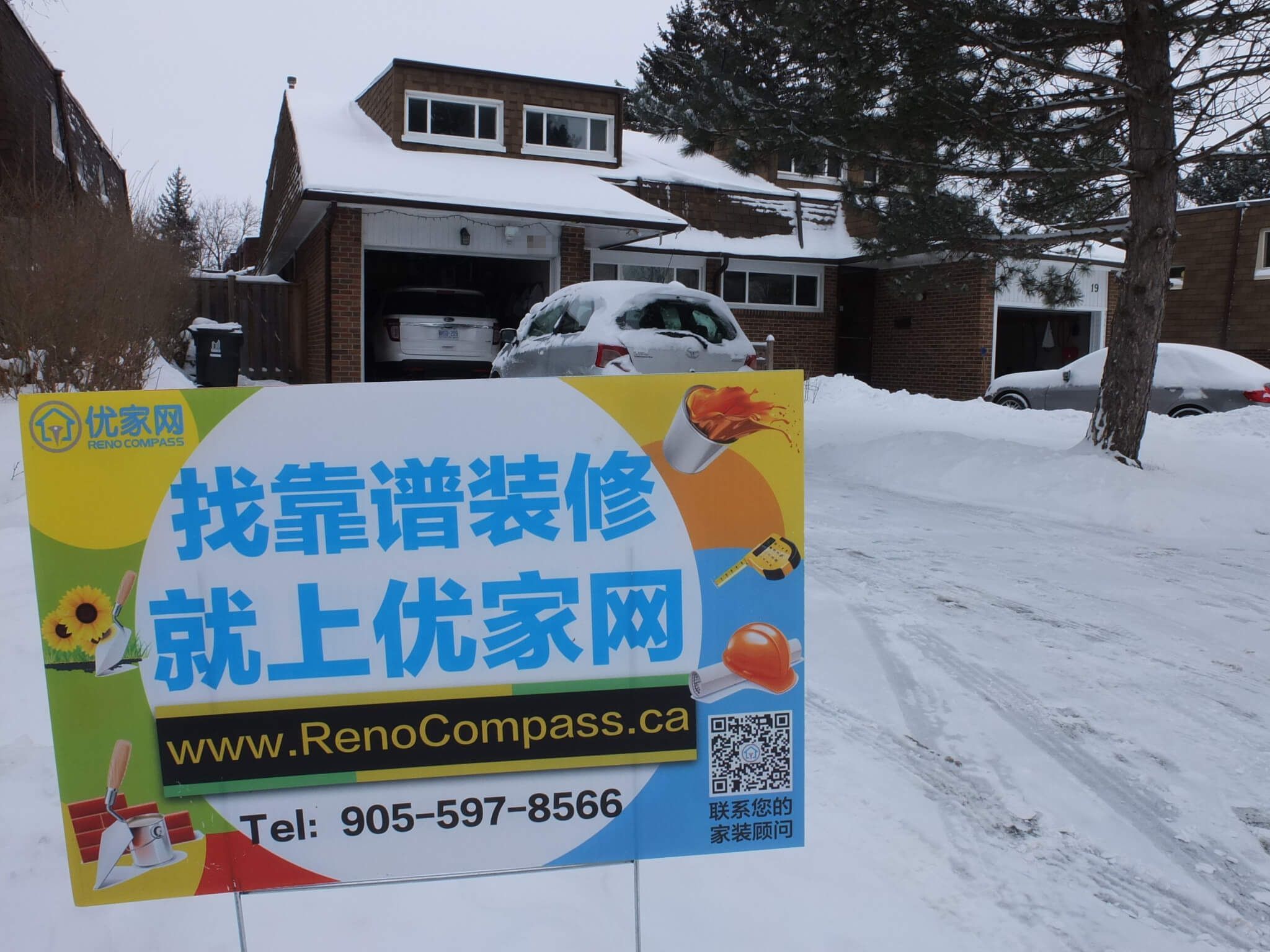 Interior renovation project in North York featuring a Reno Compass site sign displayed in front of the completed residential property. This Toronto renovation project highlights professional project management, on-site branding, and reliable execution by an experienced Toronto Renovation Company.