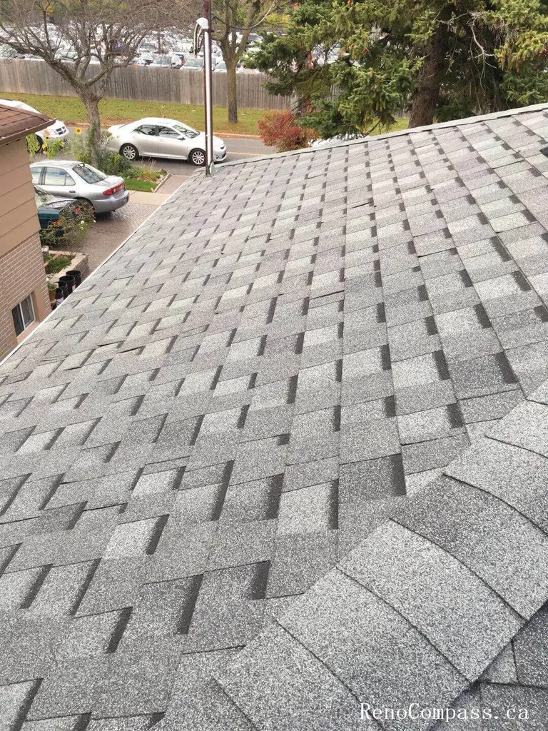 This image features the completed result of a residential roof replacement project in Toronto, showcasing newly installed asphalt shingles with a clean and uniform finish. The upgraded roofing system includes proper ventilation components and carefully aligned shingle placement to ensure long-term durability and protection against Toronto’s changing weather conditions. The project focuses on improving structural reliability, waterproof performance, and overall exterior appearance. Installed by a professional Toronto roofing and renovation team, the new roof enhances curb appeal while providing dependable, energy-efficient protection for the home throughout all seasons.