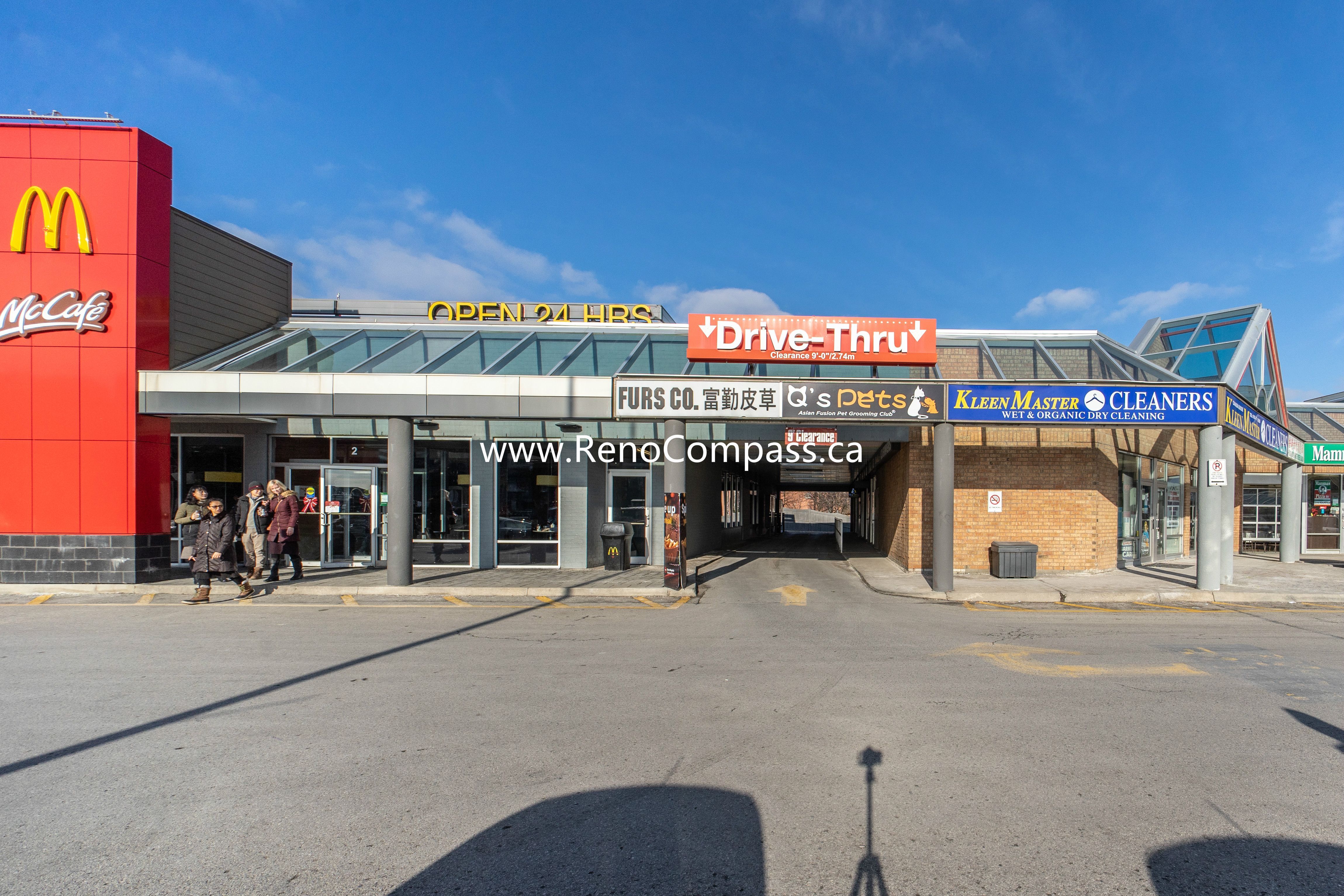 Exterior view of the newly renovated Q’s Pets pet store in Richmond Hill, showcasing updated storefront design and new signage completed by Reno Compass