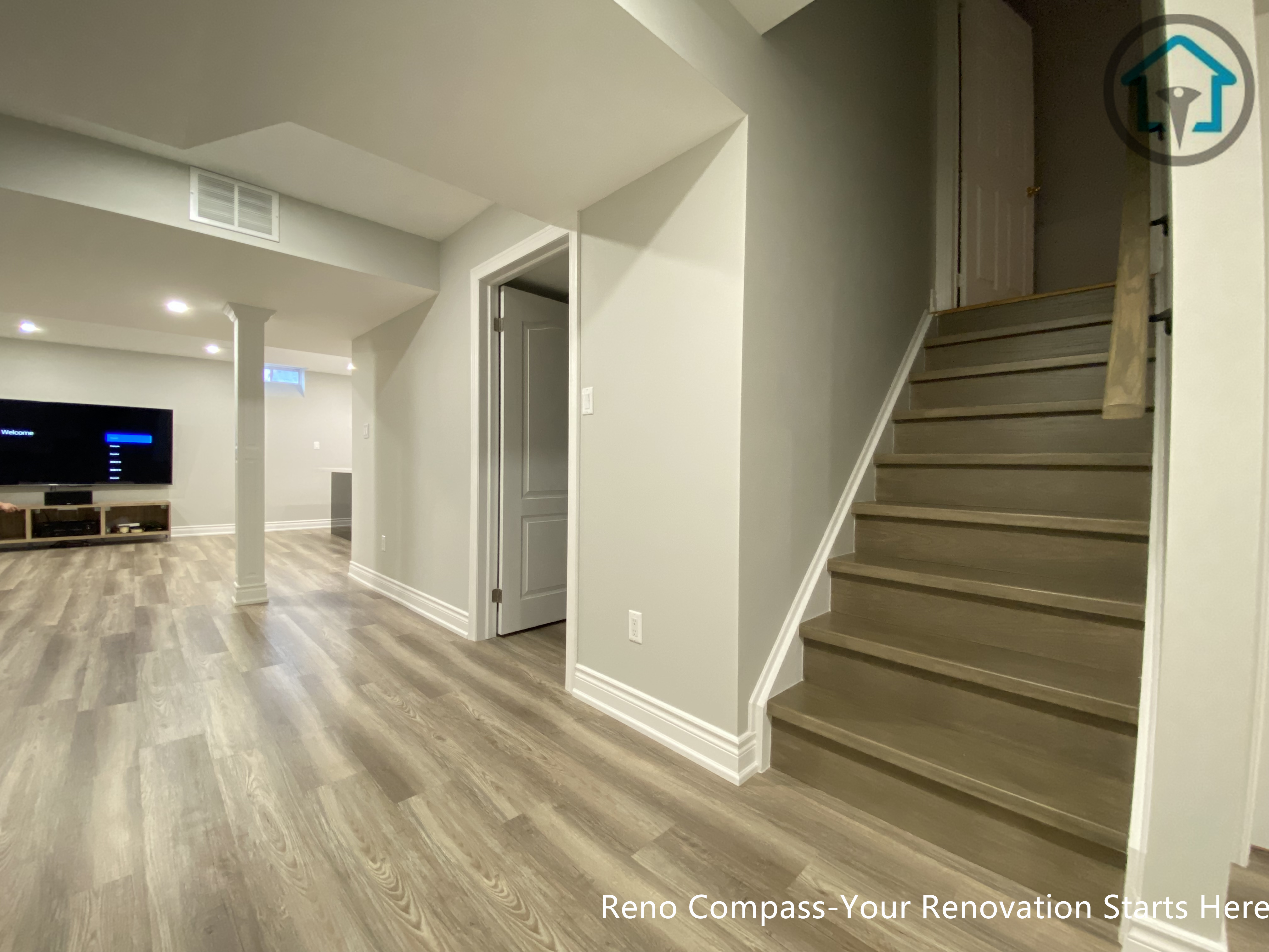 A newly completed basement renovation in Markham featuring a clean, modern layout with upgraded flooring, neutral color palette, and improved lighting to enhance overall comfort and functionality
