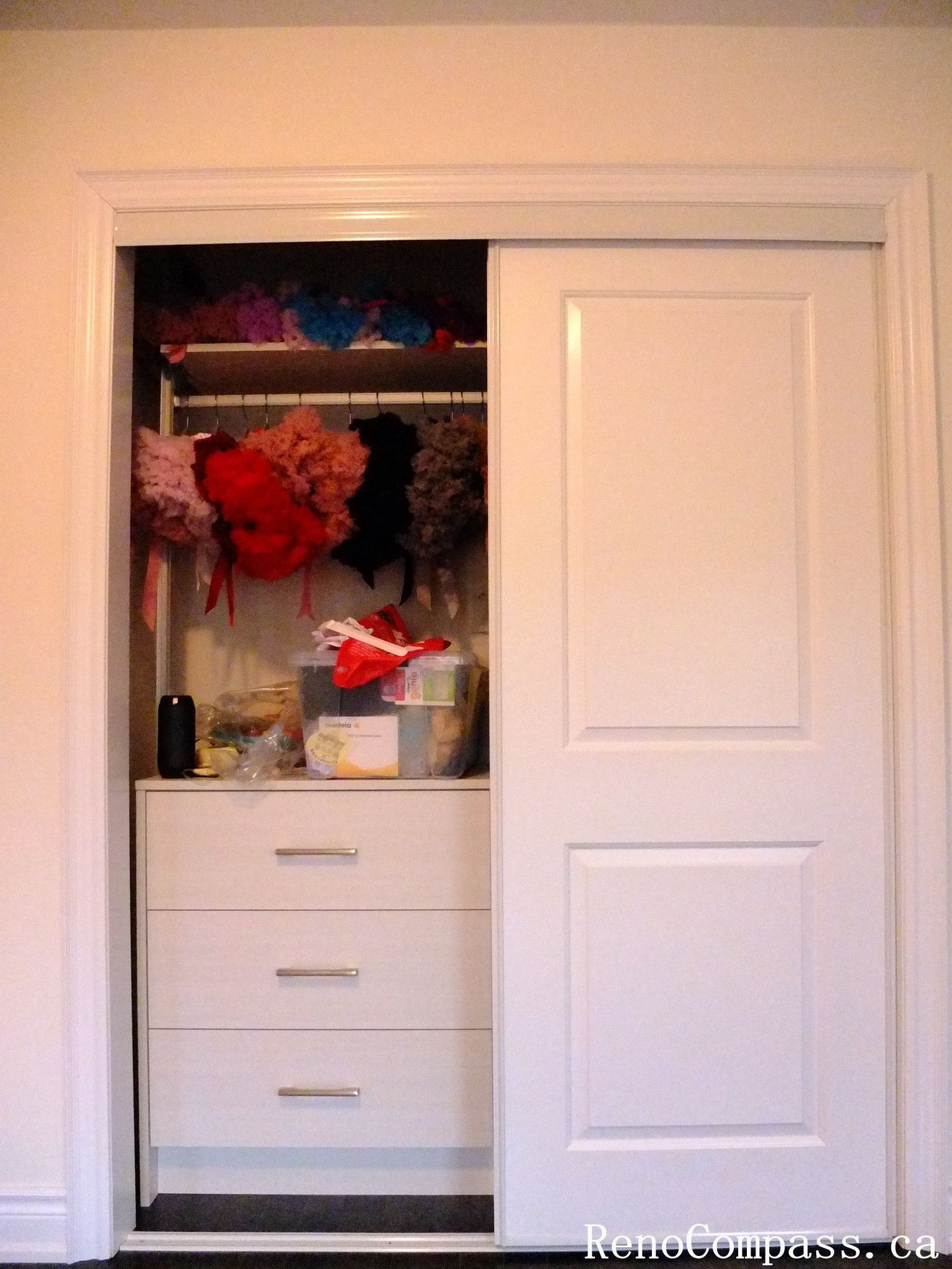 This Toronto closet cabinet upgrade features a clean sliding door system with a functional built-in drawer unit and hanging space. The design maximizes storage efficiency while keeping a modern and minimal look, perfect for organizing clothes and daily essentials in compact bedrooms.
