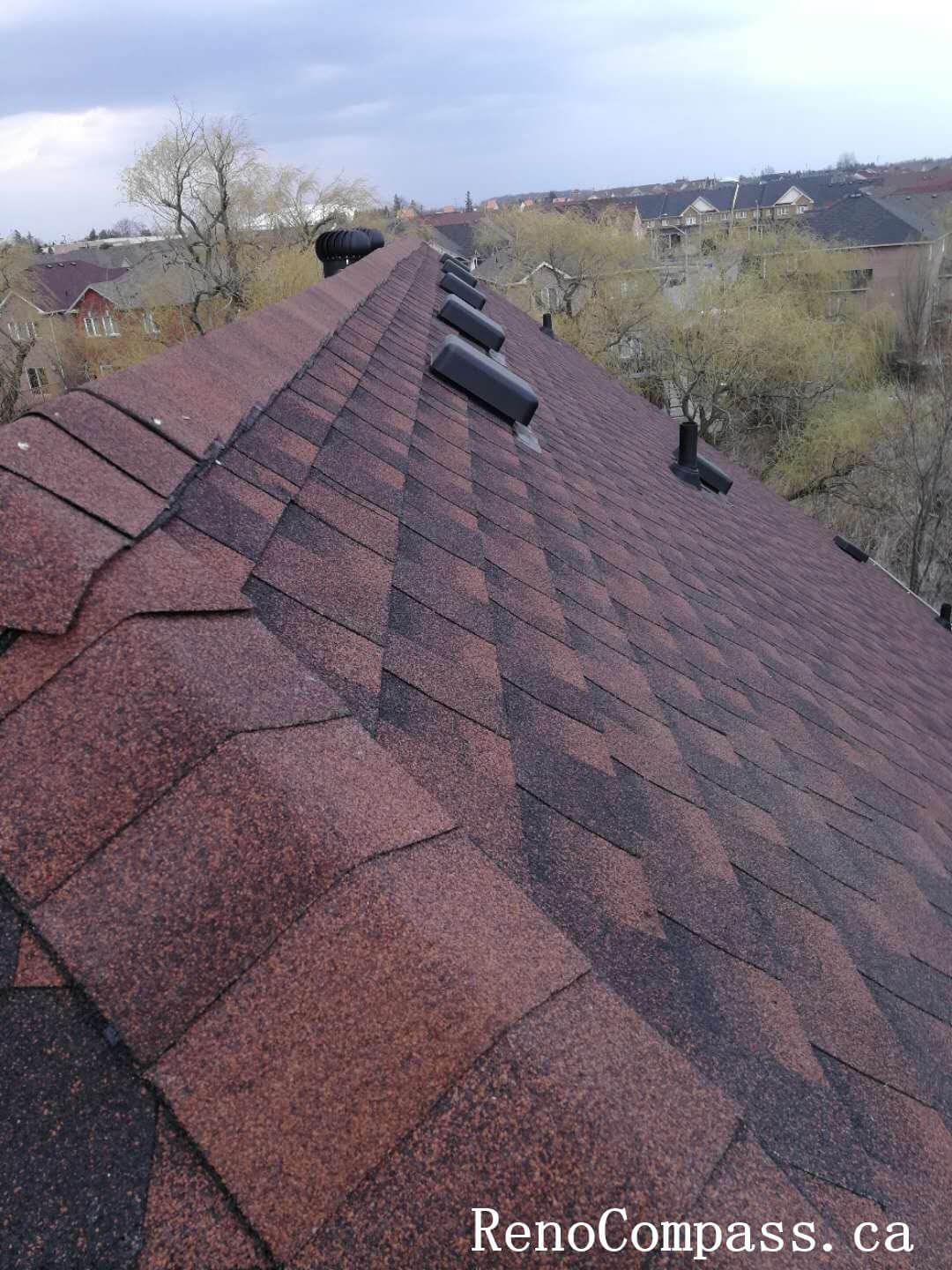 This image showcases the completed asphalt shingle installation during a roof renovation project in Richmond Hill. The shingles are precisely aligned and layered to ensure maximum waterproof performance and long-term durability. Completed by a professional Toronto roofing contractor, the upgraded roofing system enhances structural protection against snow accumulation, wind uplift, and heavy rainfall while improving overall exterior appearance.