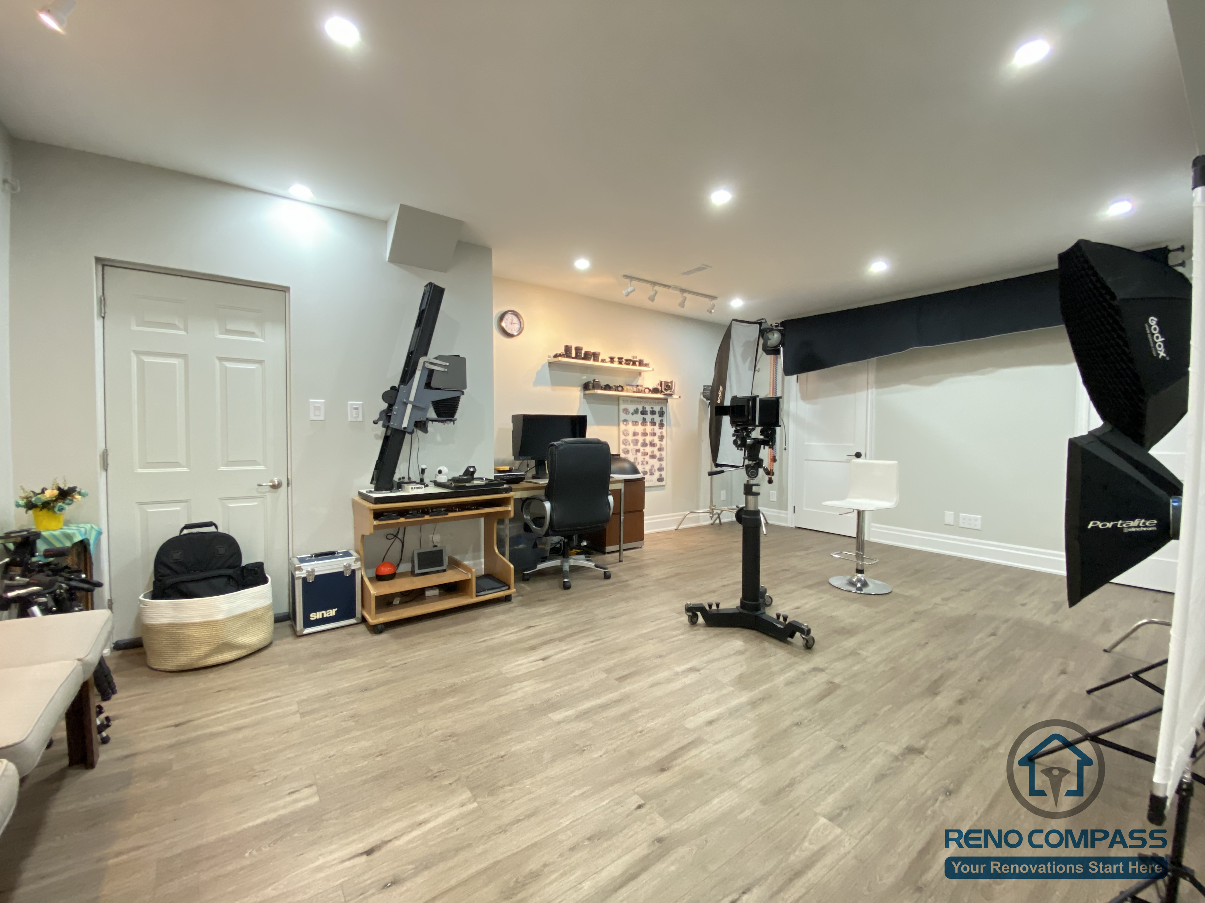 This Oakville basement renovation features a spacious multi-purpose studio designed to support creative work, photography, and flexible daily use. The open floor layout allows for large equipment setup, while recessed ceiling lights provide even illumination throughout the space. Durable wood flooring and clean wall finishes create a neutral backdrop suitable for studio activities, hobbies, or future adaptations. As a professional Toronto renovation company, Reno Compass designs basement spaces that prioritize flexibility, lighting performance, and long-term usability for evolving lifestyle needs.