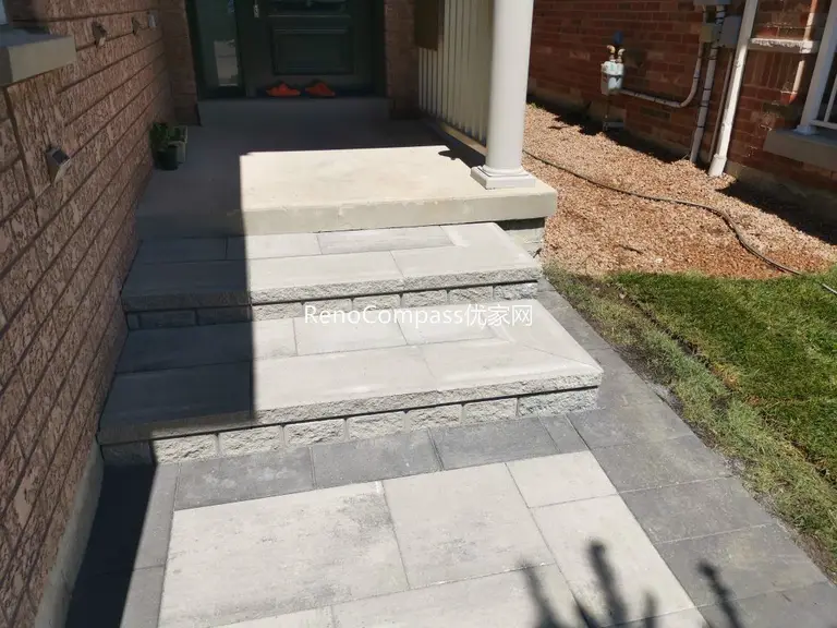 This Mississauga front entrance renovation features professionally installed interlocking stone steps and porch flooring. Clean stone lines, durable materials, and precise craftsmanship create a safe, modern, and welcoming entryway that enhances curb appeal and long-term value. Completed by an experienced Toronto renovation team.